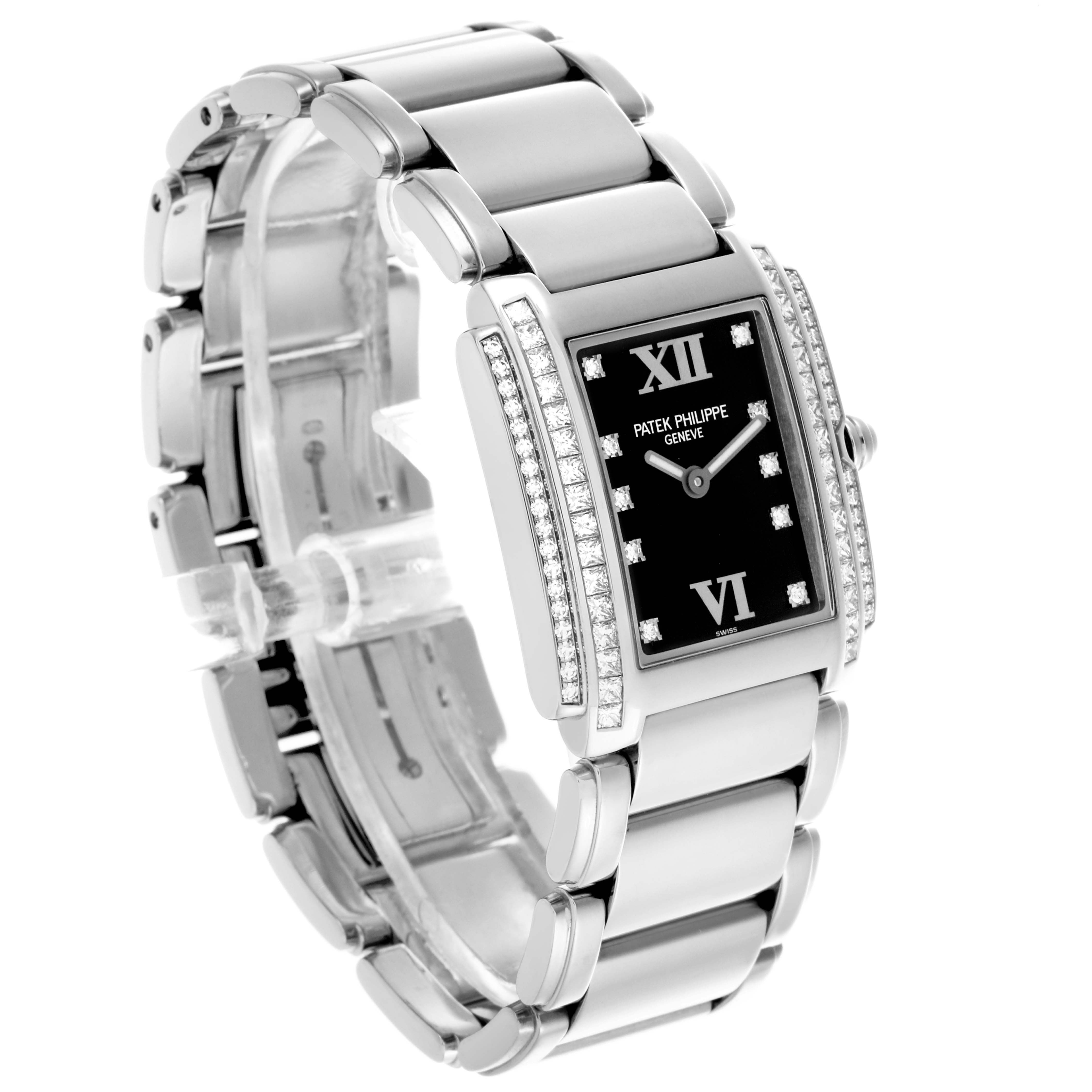 The Patek Philippe Twenty-4 4910/20G-011 Women's White Gold Black Dial 4910/20G-011 Women's White Gold Black Dial watch is shown at a slight angle, highlighting its face, bracelet, and diamond detailing.