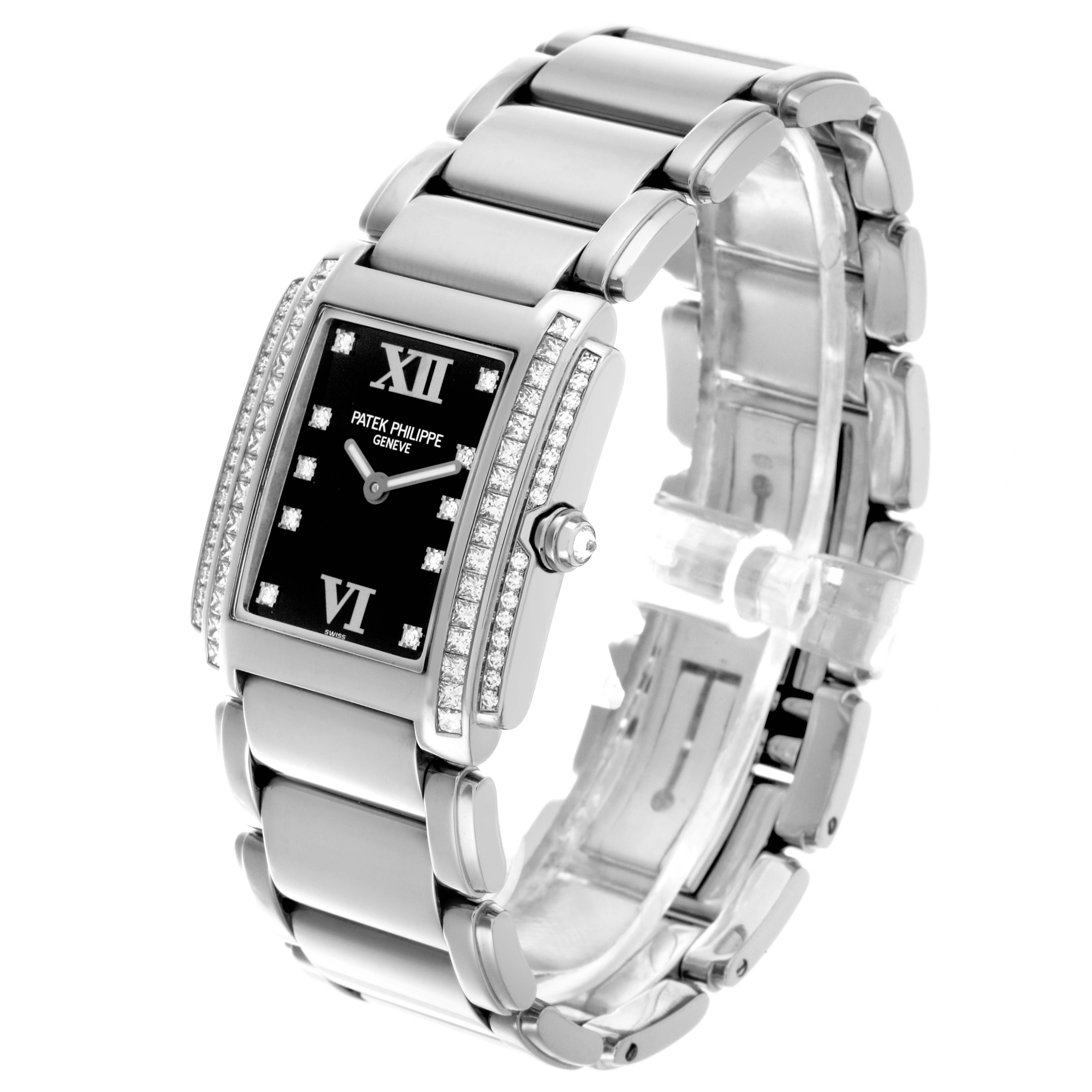The Patek Philippe Twenty-4 4910/20G-011 Women's White Gold Black Dial 4910/20G-011 Women's White Gold Black Dial watch is shown at a three-quarter angle, highlighting the bracelet, case, and diamonds.