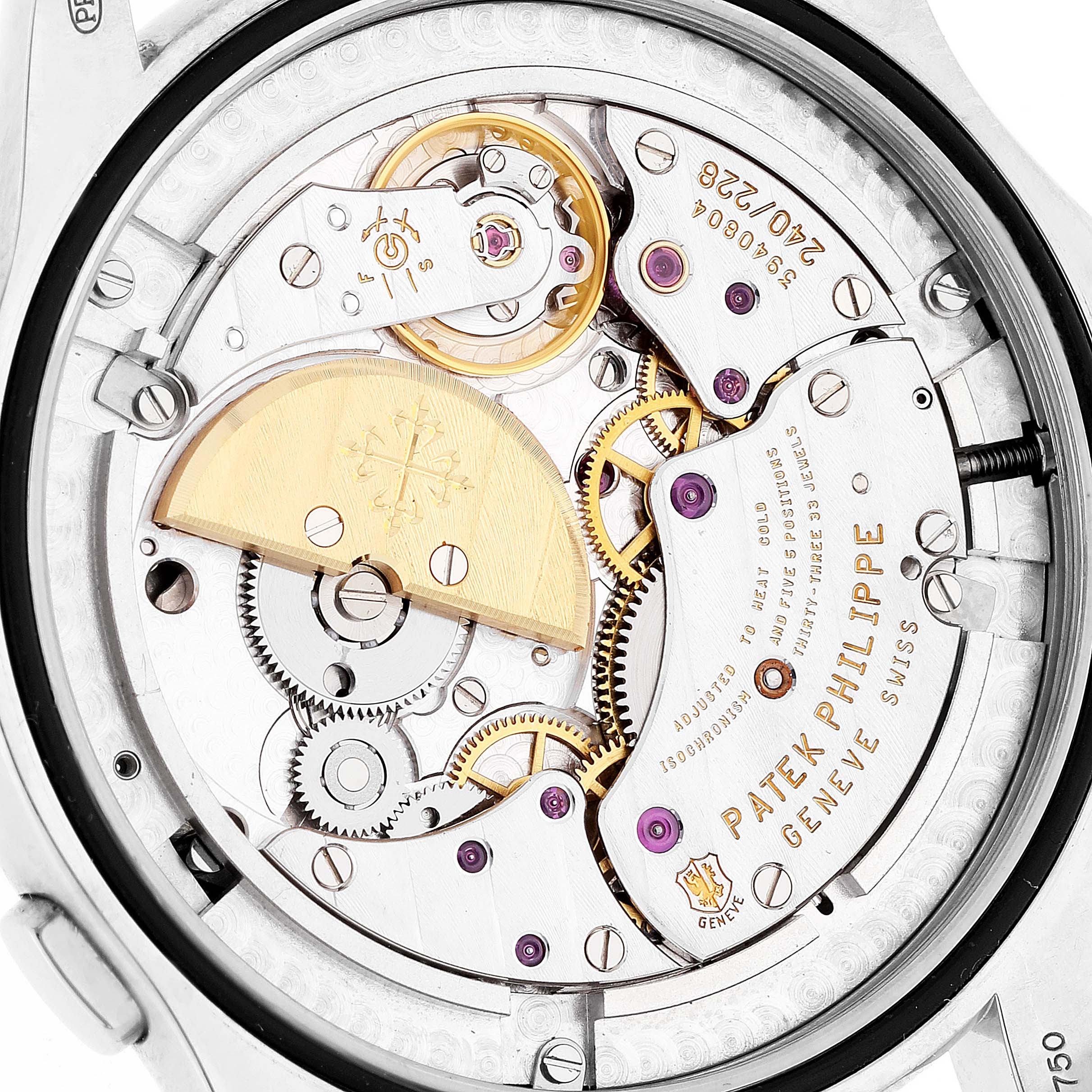 This image shows a close-up view of the intricate movement parts of a Patek Philippe Complications 5130G Men's White Gold Silver Dial 5130G Men's White Gold Silver Dial model watch.