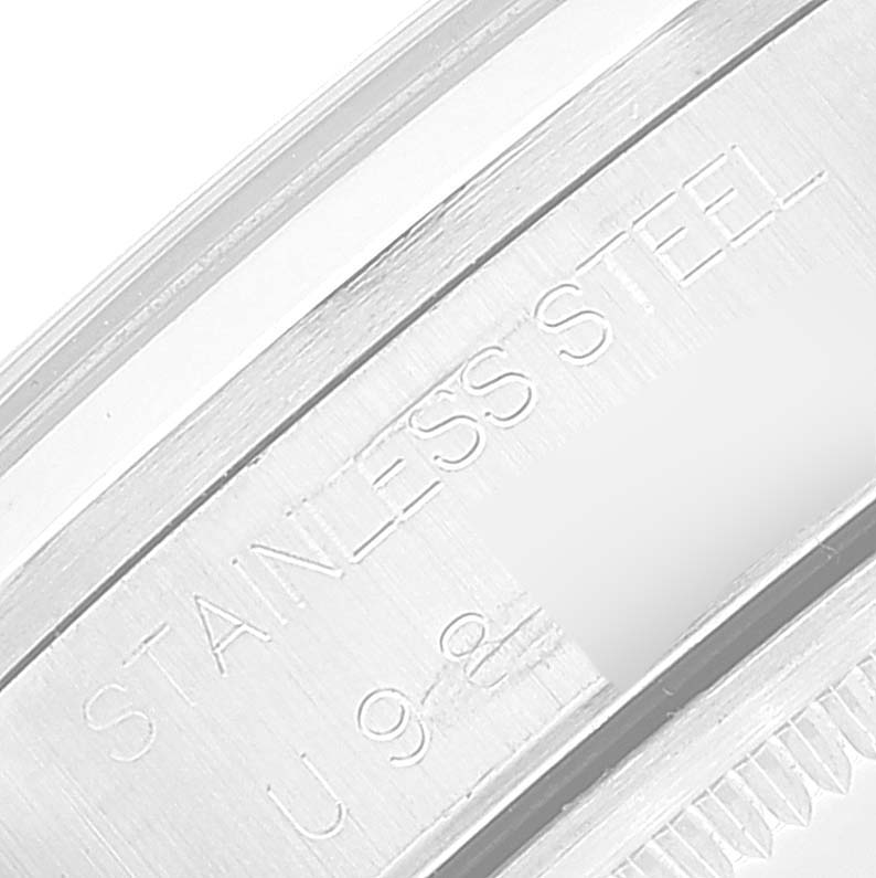 Close-up of the inner side of the bezel of a Rolex Air-King 14000 Men's Stainless Steel Blue Dial 14000 Men's Stainless Steel Blue Dial, showing "STAINLESS STEEL" engraving.