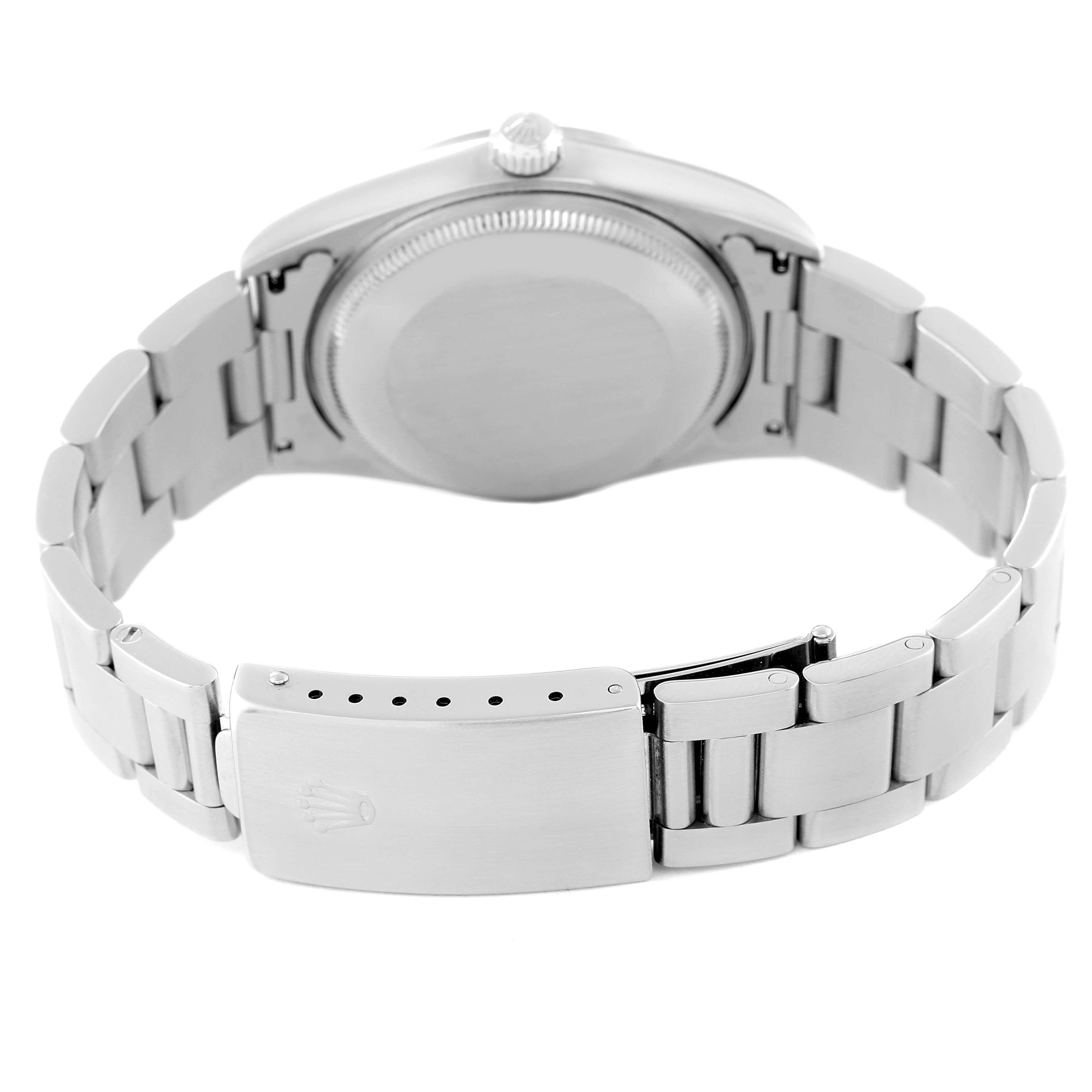 The image shows the back view of the Rolex Air-King 14000 Men's Stainless Steel Blue Dial 14000 Men's Stainless Steel Blue Dial watch, highlighting its closed clasp, bracelet, and case back.