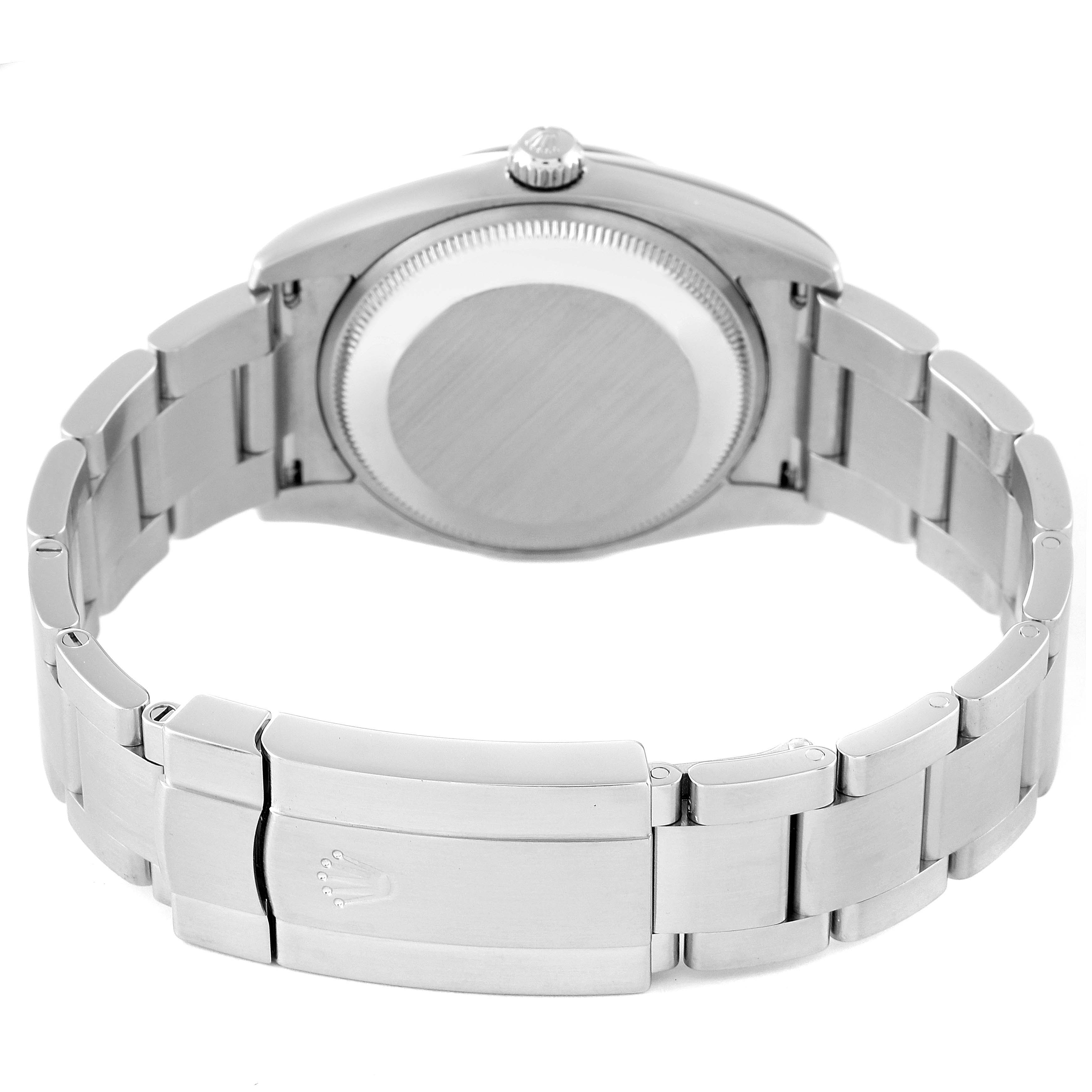 This image shows the back view of a Rolex Air-King 114200 Men's Stainless Steel Silver Dial 114200 Men's Stainless Steel Silver Dial watch, highlighting the case back and bracelet clasp.