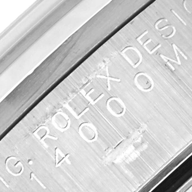 The image shows an engraved side view of the Rolex Air-King 14000M Men's Stainless Steel Silver Dial 14000M Men's Stainless Steel Silver Dial's watch case, highlighting the model and design inscription.