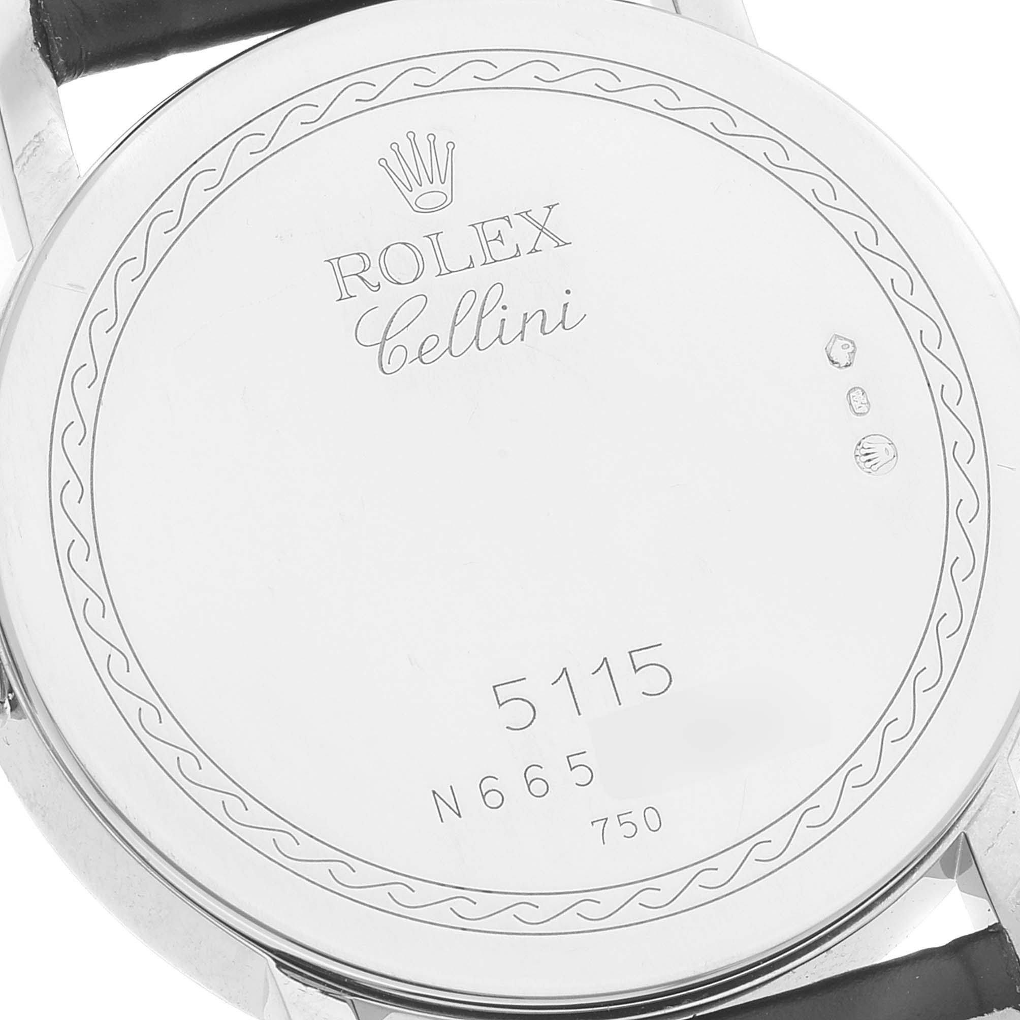 The image shows the back case of a Rolex Cellini 5115/9 Men
s White Gold Beige Dial 5115/9 Men
s White Gold Beige Dial watch, highlighting the engraved brand and model details.