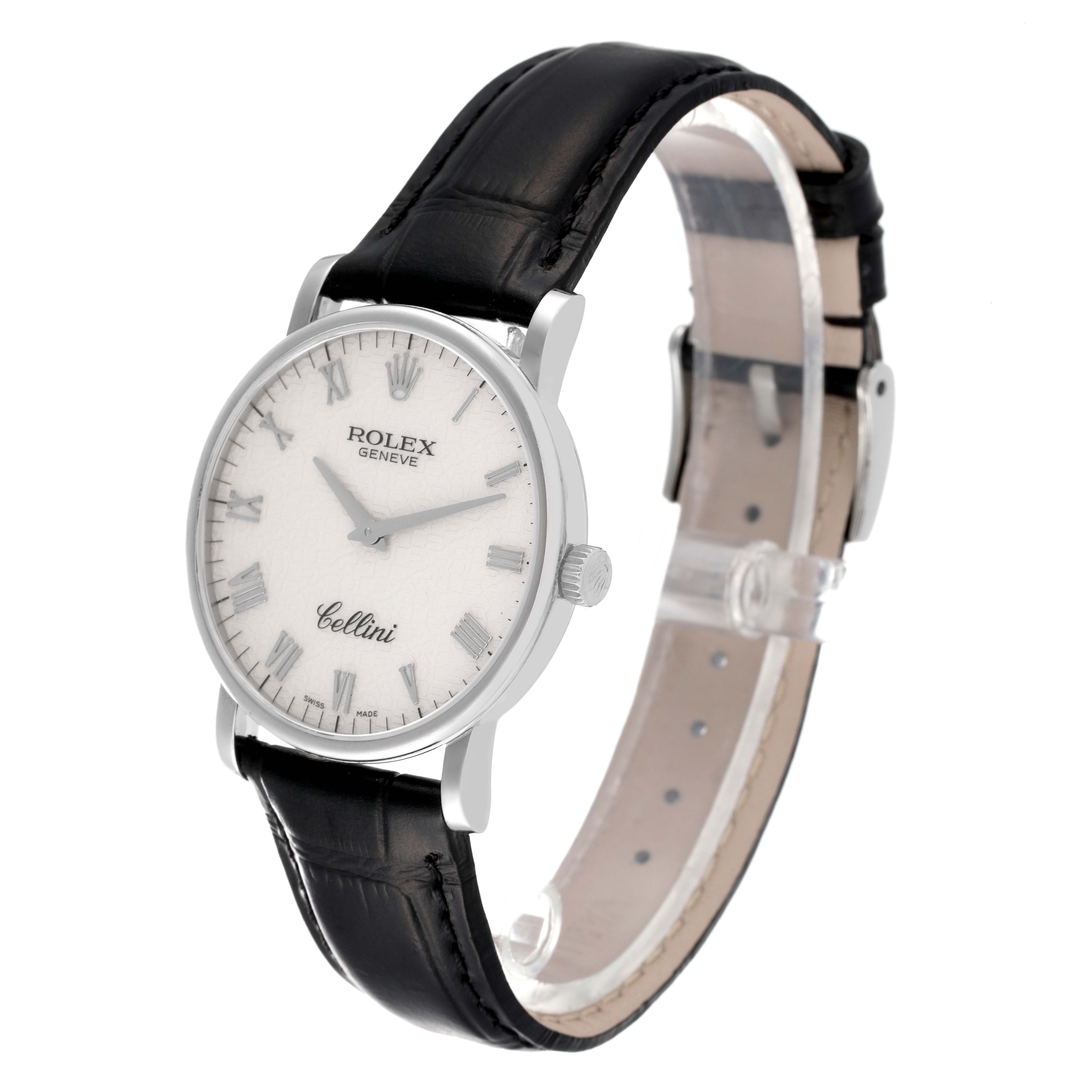 The Rolex Cellini 5115/9 Men
s White Gold Beige Dial 5115/9 Men
s White Gold Beige Dial watch is shown at an angled side view, displaying its face and black leather strap.