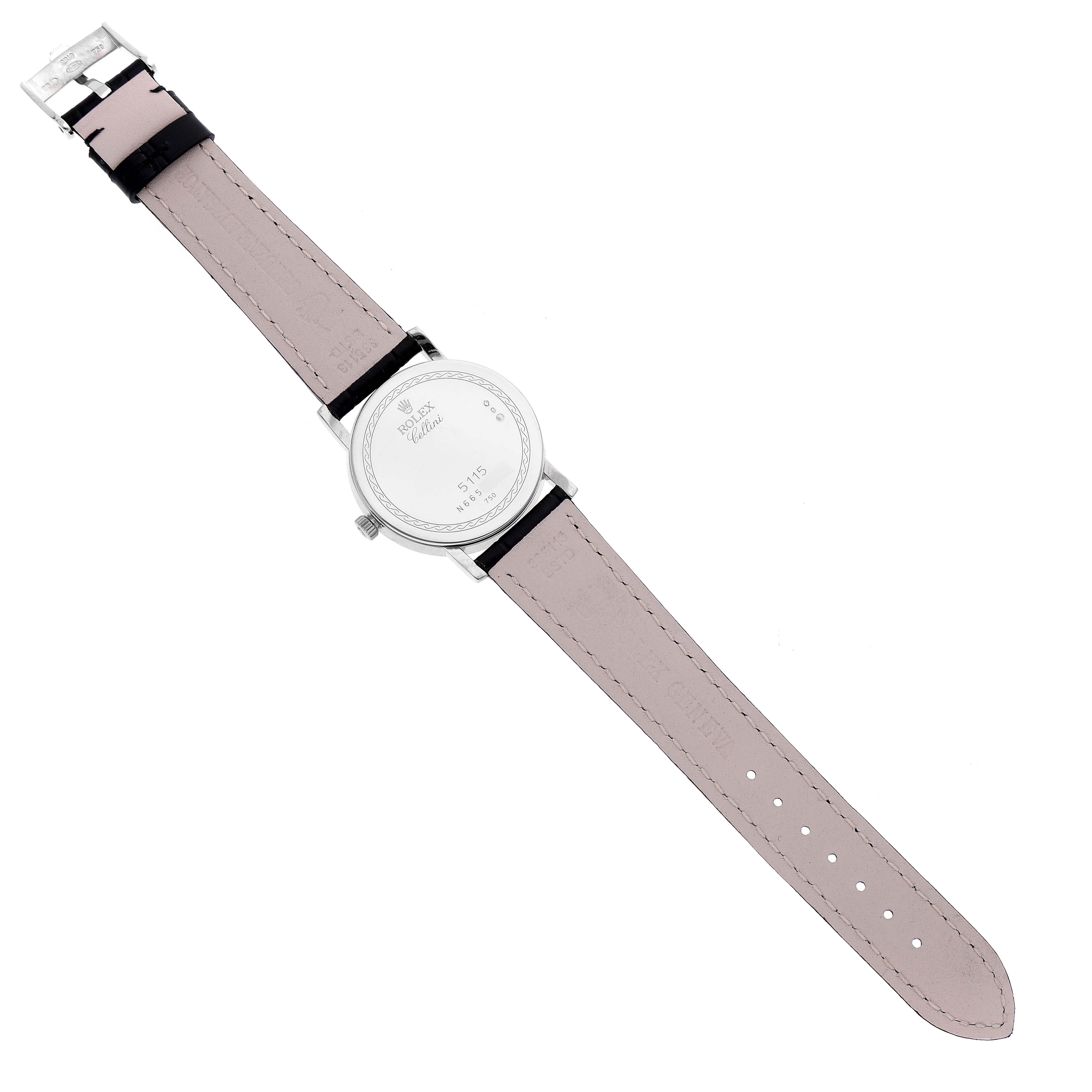 The image shows the back view of a Rolex Cellini 5115/9 Men
s White Gold Beige Dial 5115/9 Men
s White Gold Beige Dial watch, displaying its case back and leather strap.