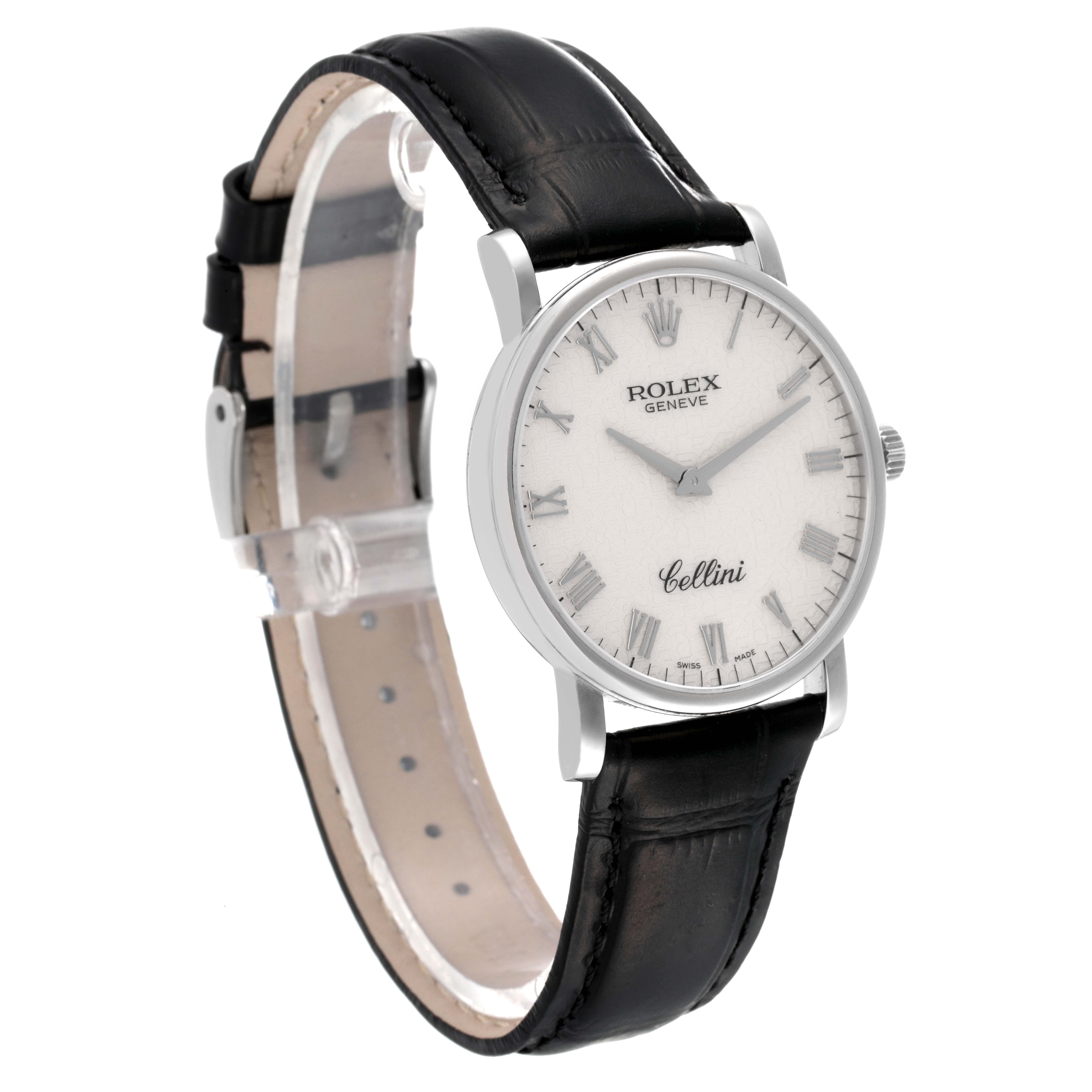 The image shows a side angle of the Rolex Cellini 5115/9 Men
s White Gold Beige Dial 5115/9 Men
s White Gold Beige Dial watch, featuring its round white dial, Roman numerals, and black leather strap.