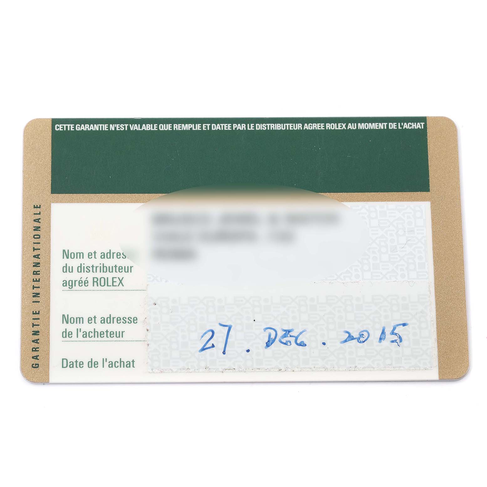 This is the warranty card for a Rolex Cellini 5115/9 Men
s White Gold Beige Dial 5115/9 Men
s White Gold Beige Dial watch, showing the purchase date and blurred distributor and buyer details.