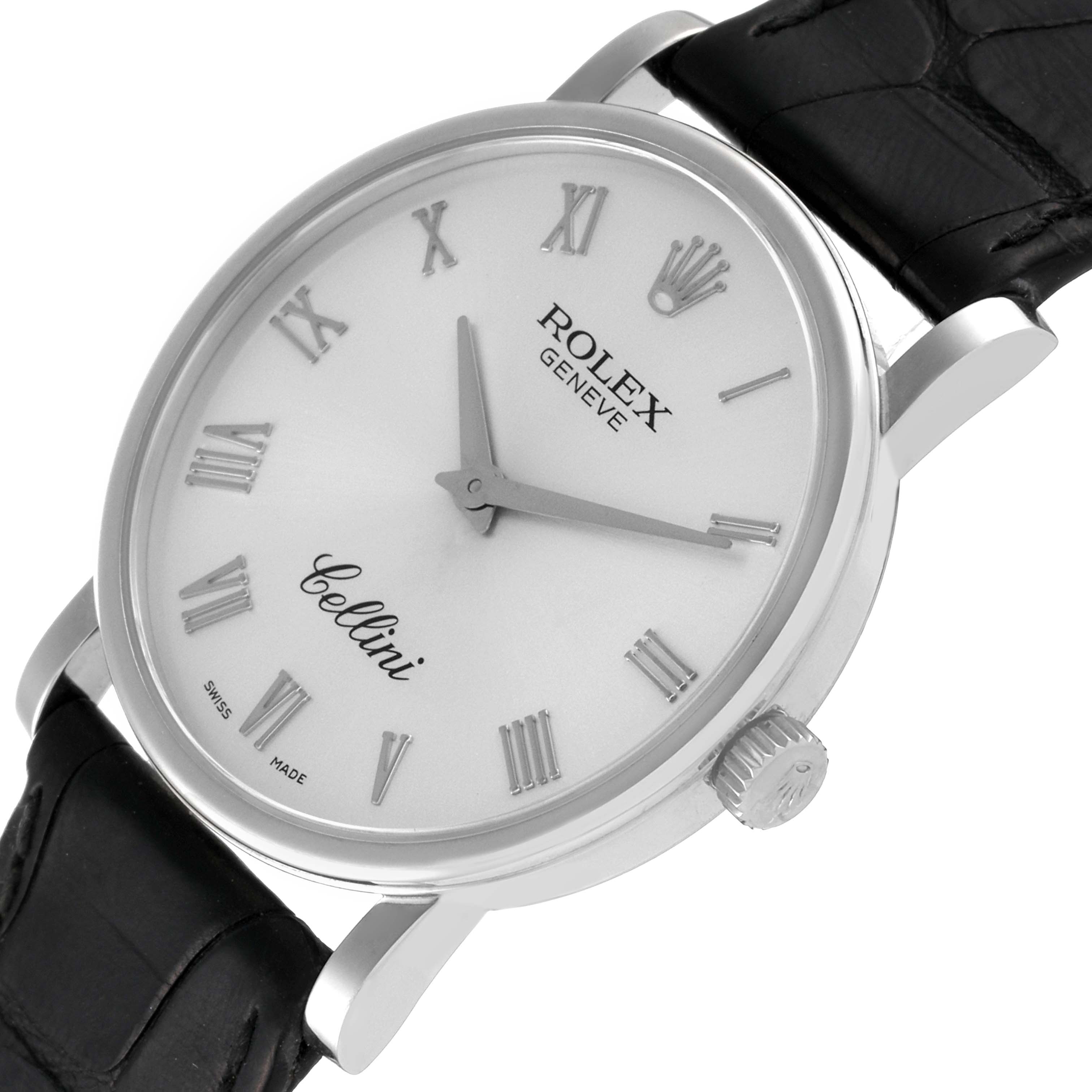 The Rolex Cellini 5115 Men's White Gold Silver Dial 5115 Men's White Gold Silver Dial watch is shown at a slight angle, displaying its face, crown, and part of its black leather strap.