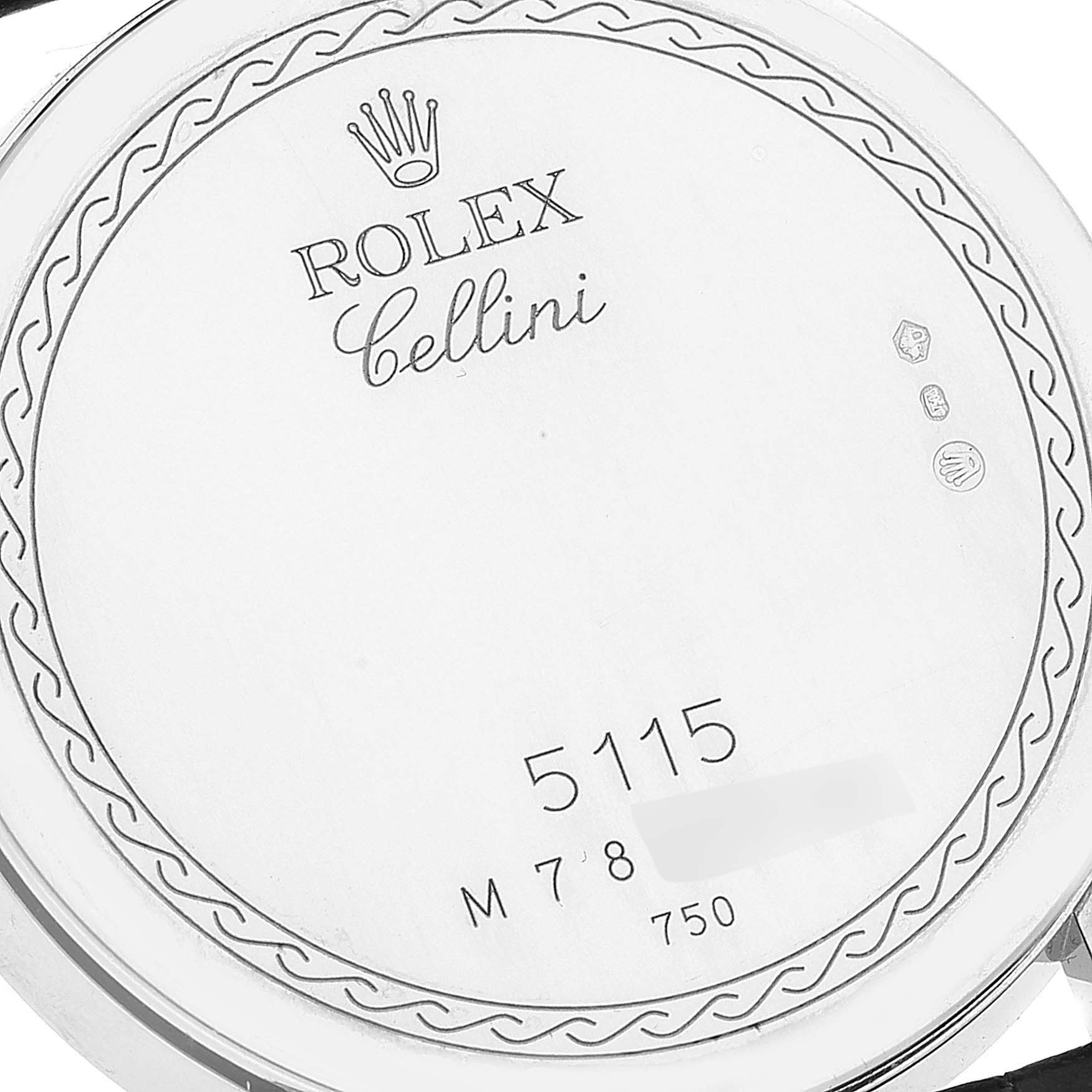 This image shows the back case of a Rolex Cellini 5115 Men's White Gold Silver Dial 5115 Men's White Gold Silver Dial model watch, highlighting its engravings and serial numbers.