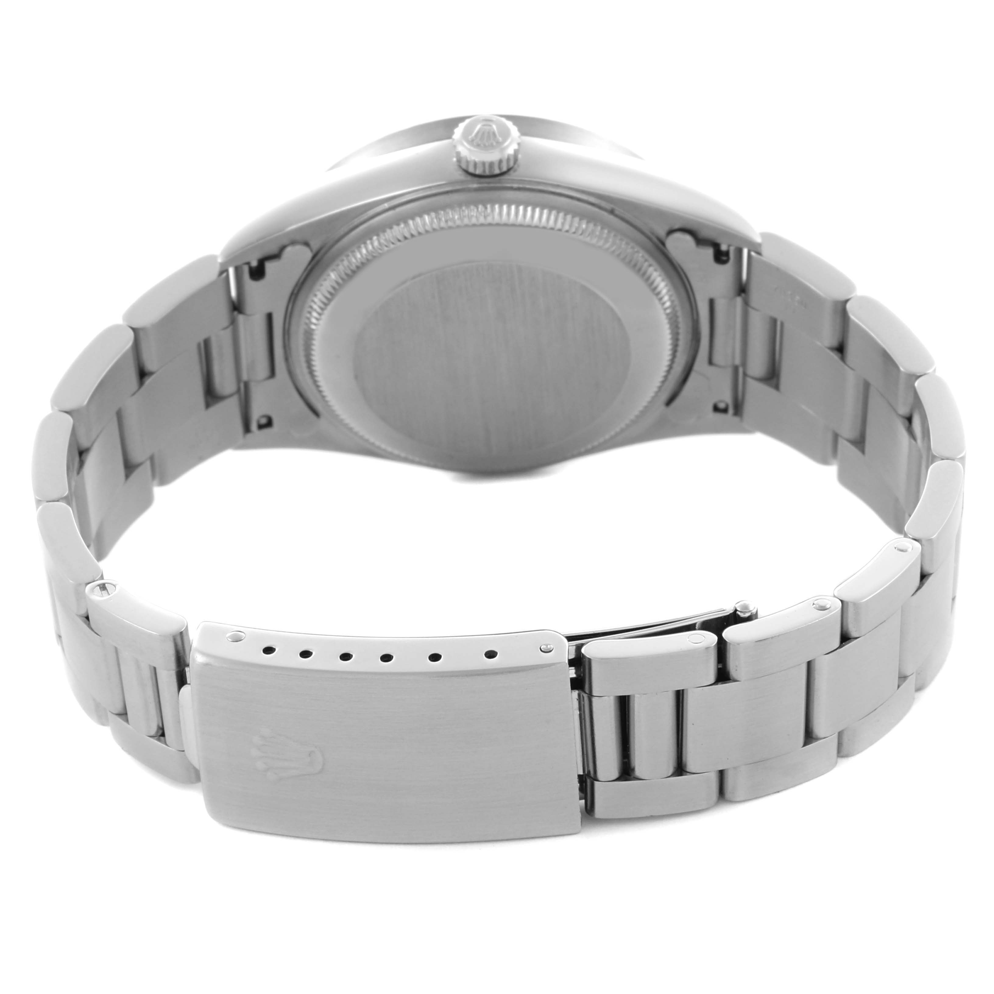 The image shows the back and bracelet of the Rolex Date 15210 Men
s Stainless Steel Black Dial 15210 Men
s Stainless Steel Black Dial watch, featuring the clasp and case back.