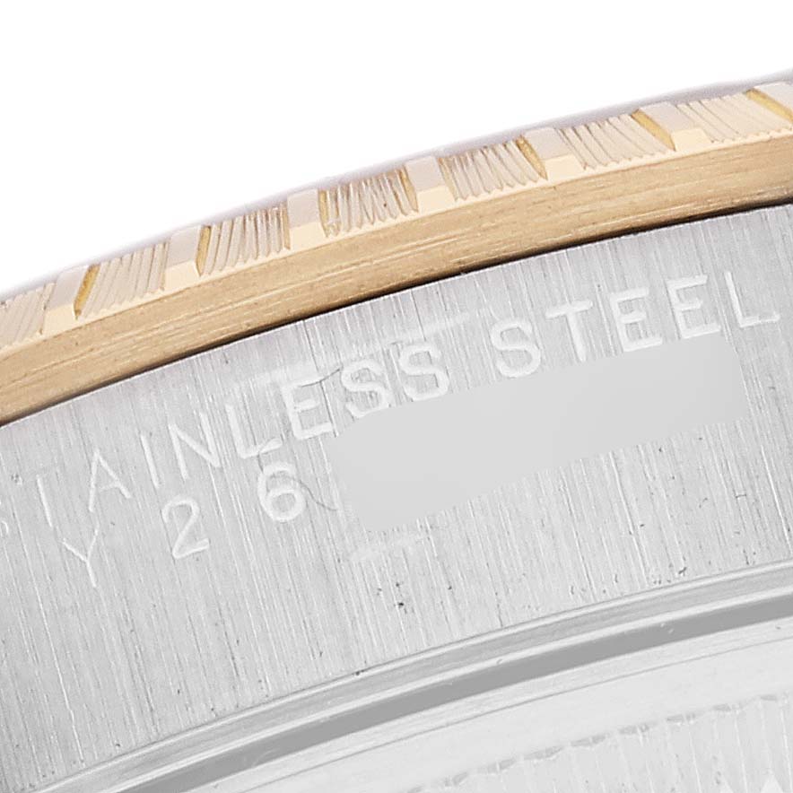 The image shows a close-up of the stainless steel and gold bezel of a Rolex Date 15223 Men
s Steel and Gold (two tone) White Dial 15223 Men
s Steel and Gold (two tone) White Dial model watch.