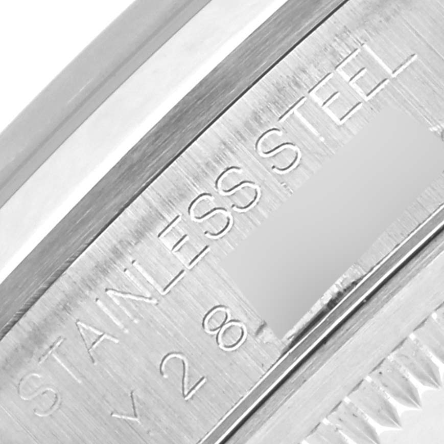 The image focuses on the stainless steel inner rim of a Rolex Datejust 16200 Men's Stainless Steel Black Dial 16200 Men's Stainless Steel Black Dial watch.