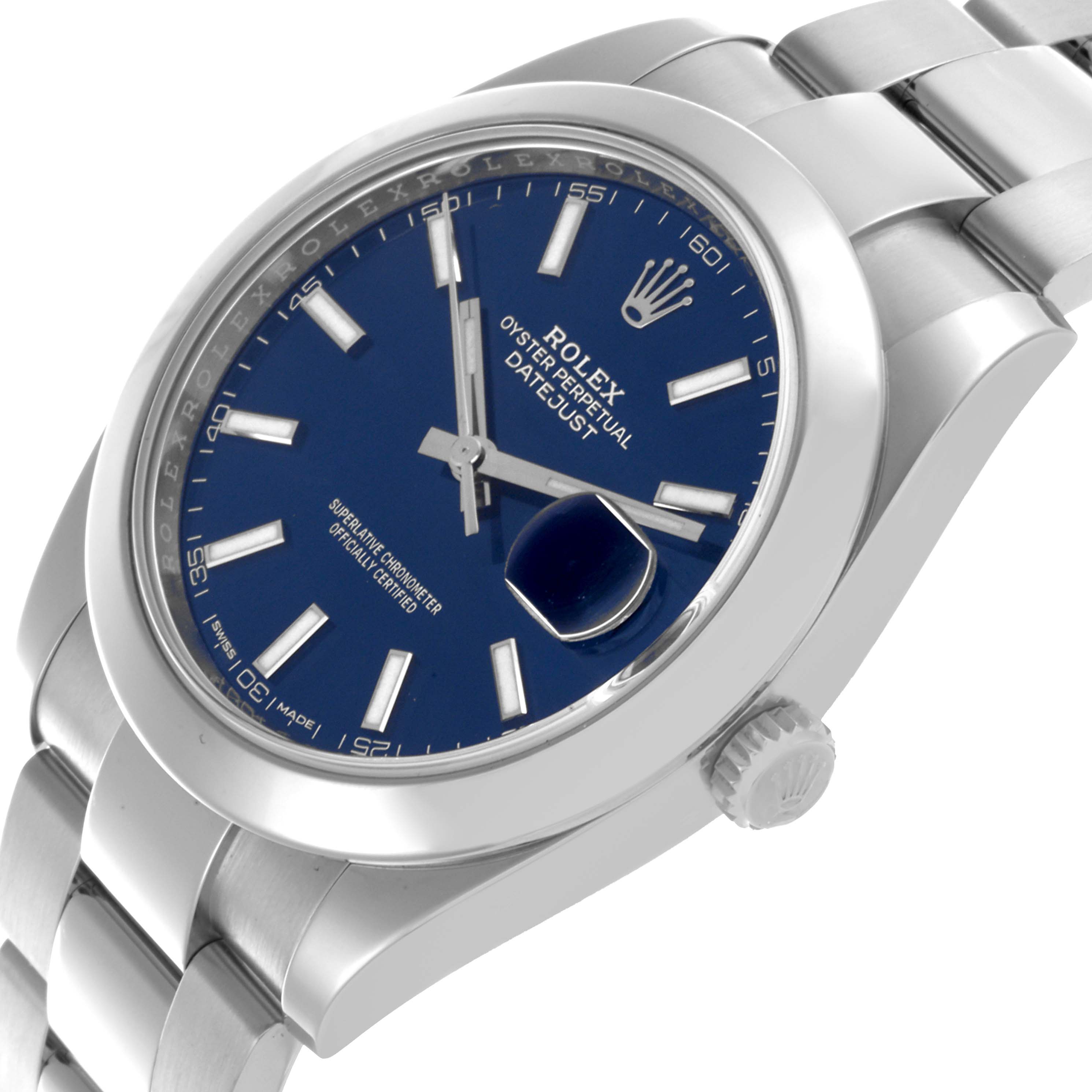 The Rolex Datejust 41 126300 Men
s Stainless Steel Blue Dial 126300 Men
s Stainless Steel Blue Dial is shown at an oblique angle, highlighting the dial, bezel, crown, and bracelet.