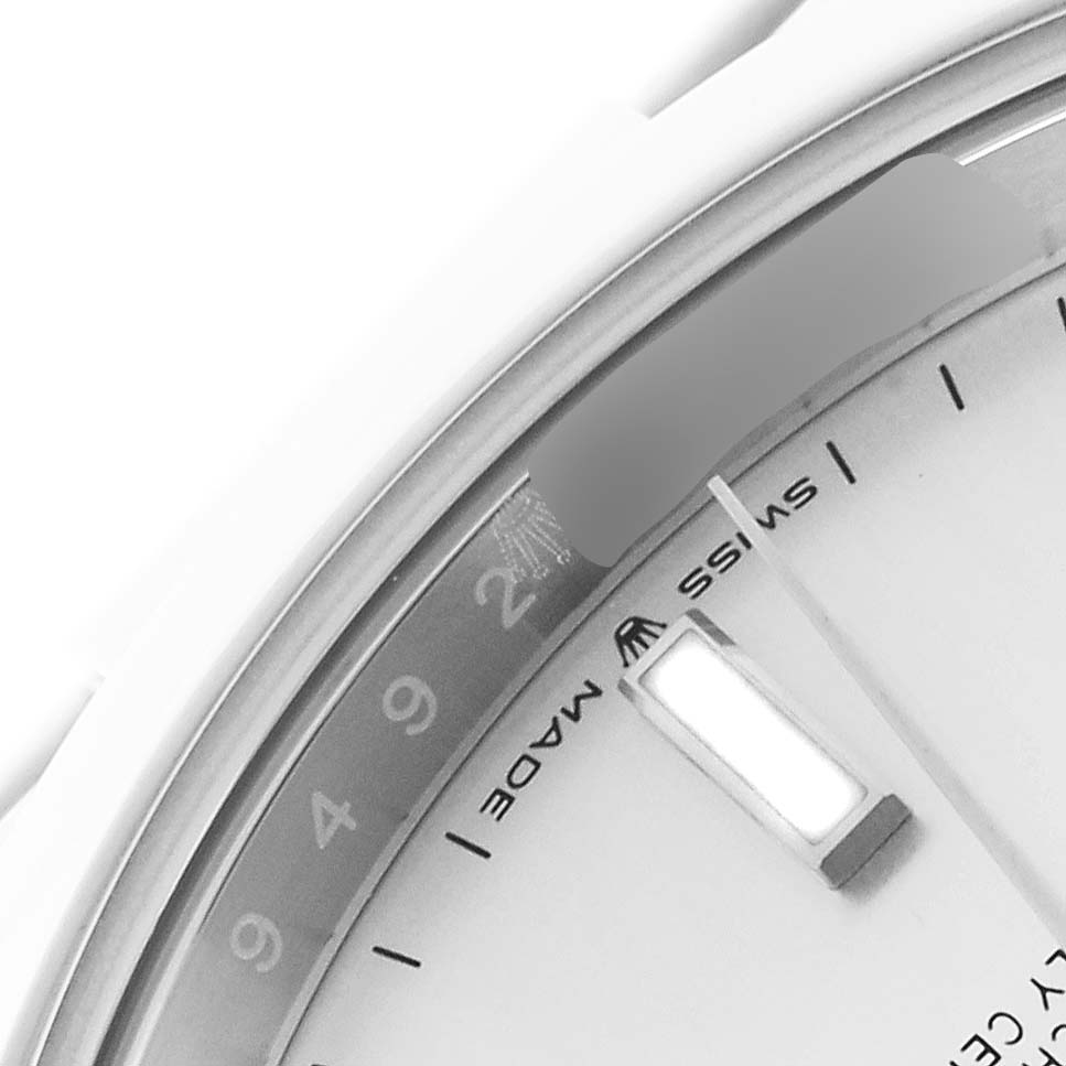 The image shows a close-up angle of the dial and rehaut of the Rolex Datejust 41 126300 Men's Stainless Steel Silver Dial 126300 Men's Stainless Steel Silver Dial, highlighting the crown logo and minute markers.
