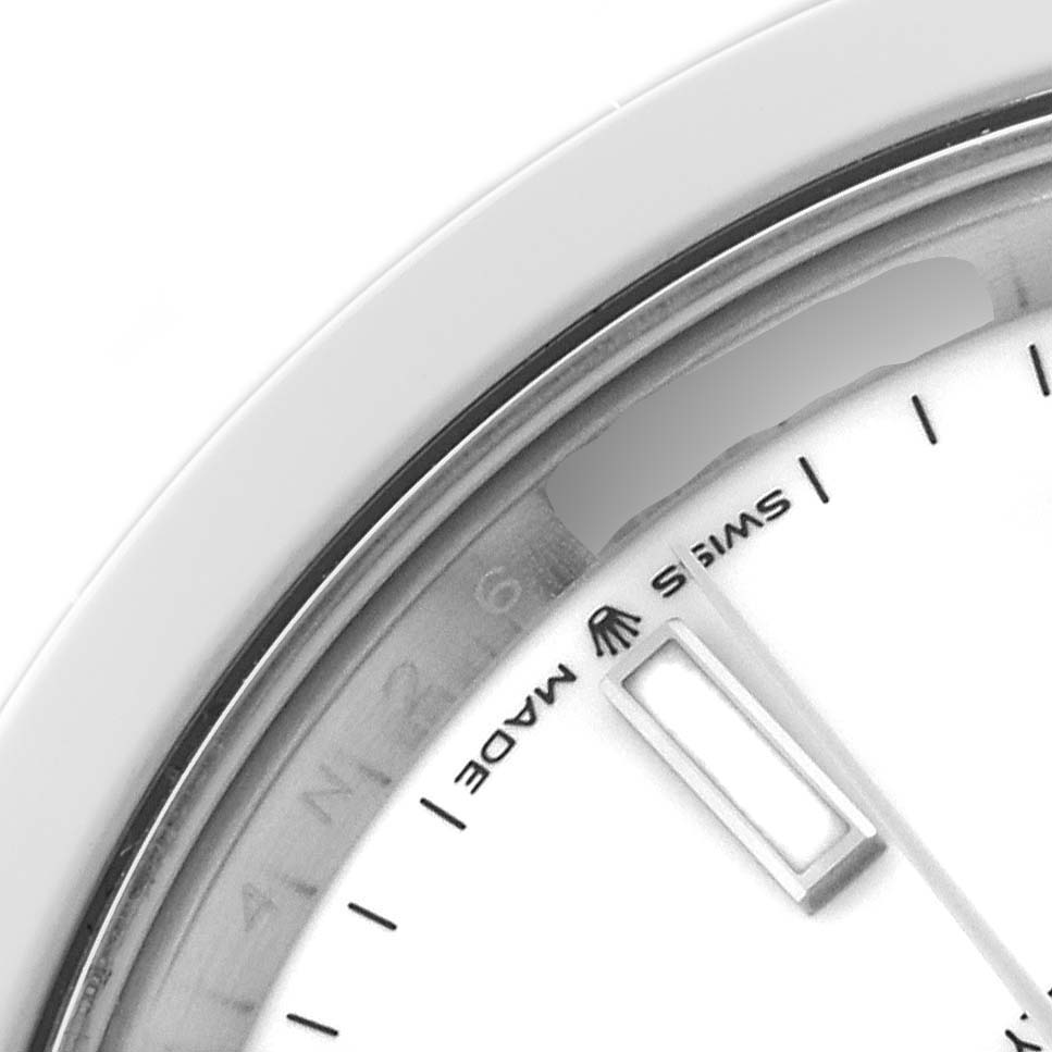 The image shows a close-up of the dial and bezel of a Rolex Datejust 41 126300 Men's Stainless Steel White Dial 126300 Men's Stainless Steel White Dial, focusing on the "Swiss Made" text.