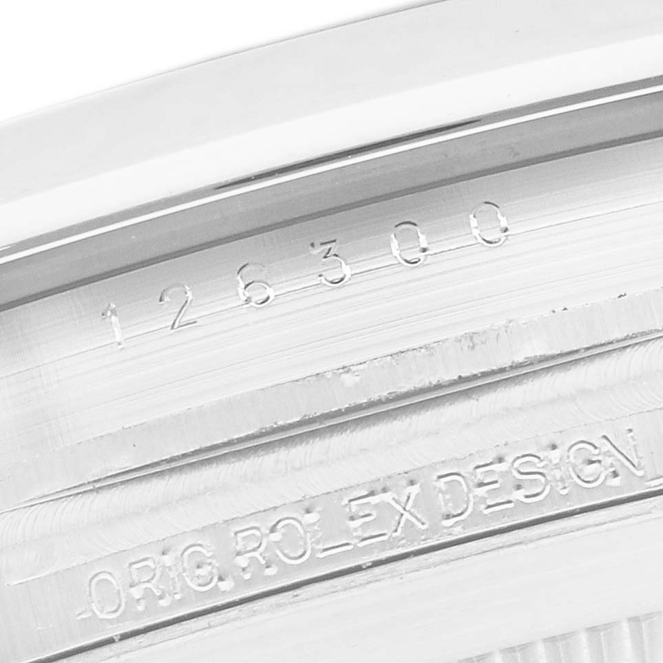 The image shows the engraved reference number on the case of a Rolex Datejust 41 126300 Men's Stainless Steel White Dial 126300 Men's Stainless Steel White Dial watch from a close-up angle.