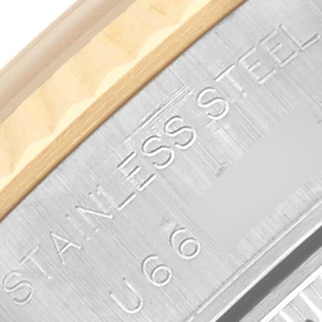 The image shows a close-up of the stainless steel and gold bezel edge of a Rolex Datejust 69173 Women's Steel and Gold (two tone) Blue Dial 69173 Women's Steel and Gold (two tone) Blue Dial watch.