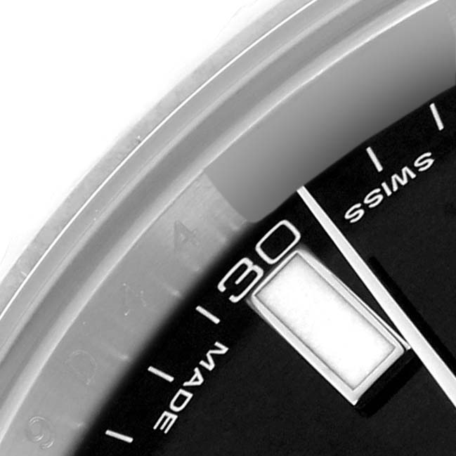 The image shows a close-up of the dial corner of the Rolex Datejust 41 116334 Men
s Stainless Steel Black Dial 116334 Men
s Stainless Steel Black Dial, highlighting the 30-minute marker and "Swiss Made" text.
