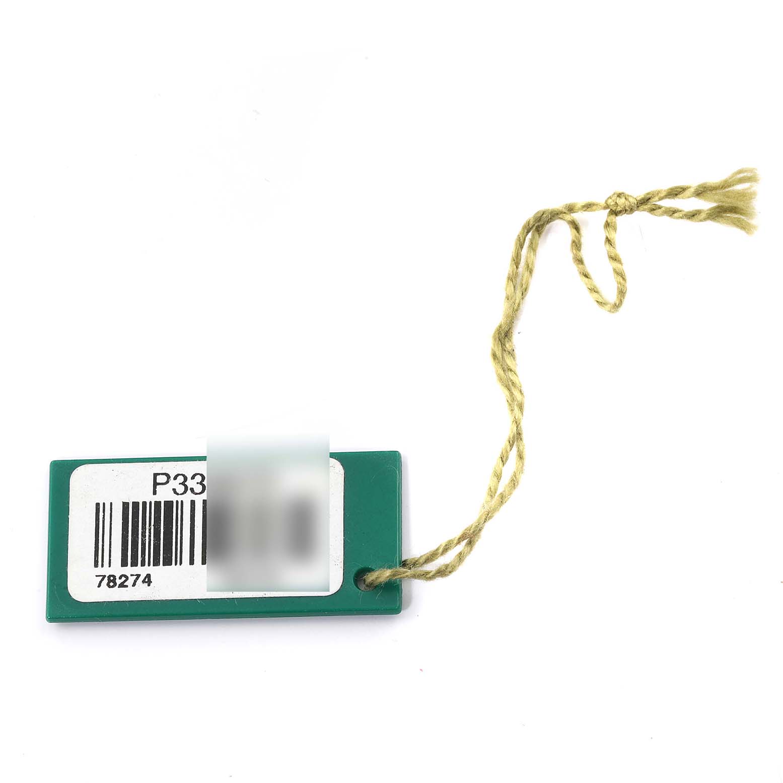 This is a close-up view of a green Rolex tag for a Mid-Size model, featuring a barcode and a yellow string.