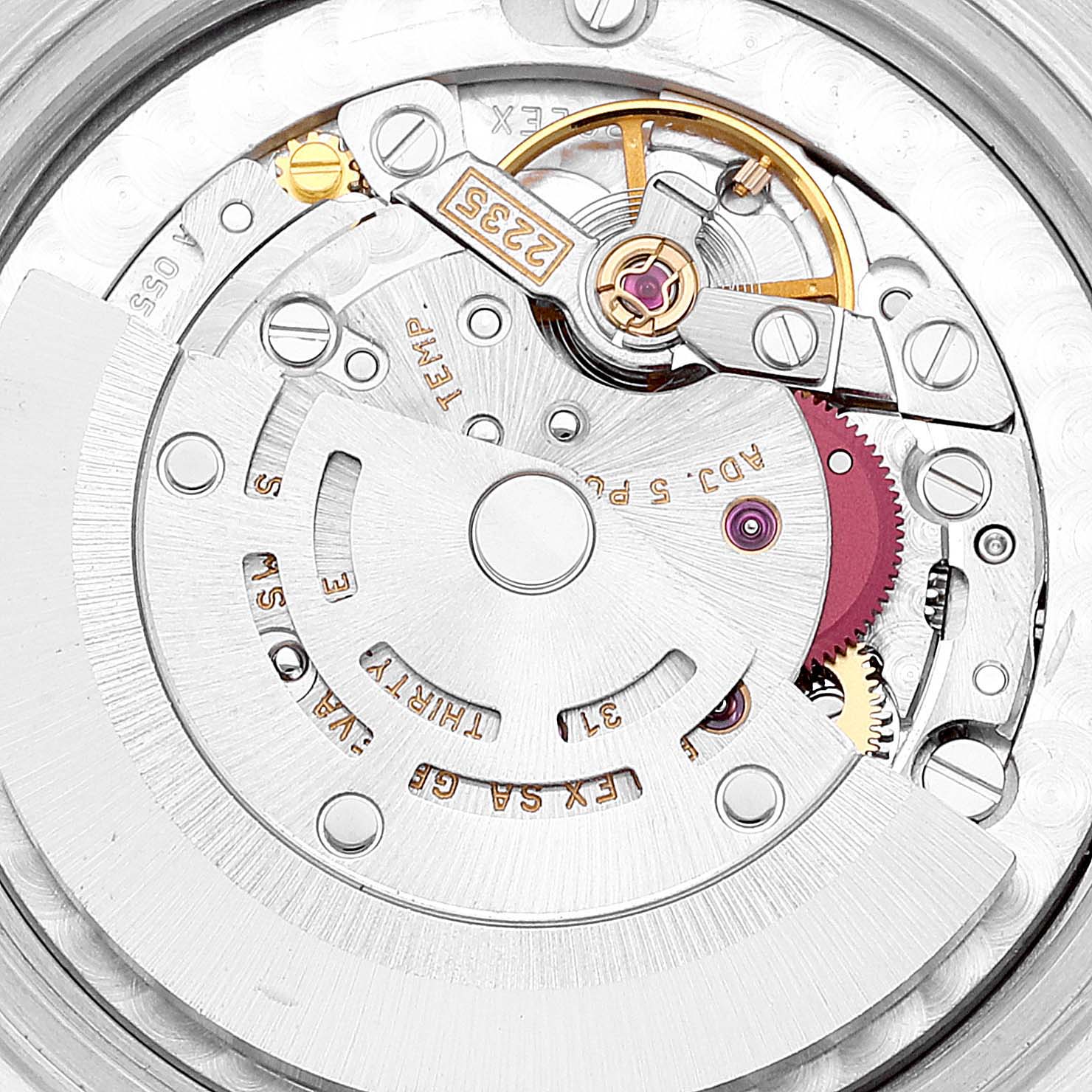 This image shows the internal mechanical movement of a Mid-Size Rolex watch, viewed from the back.