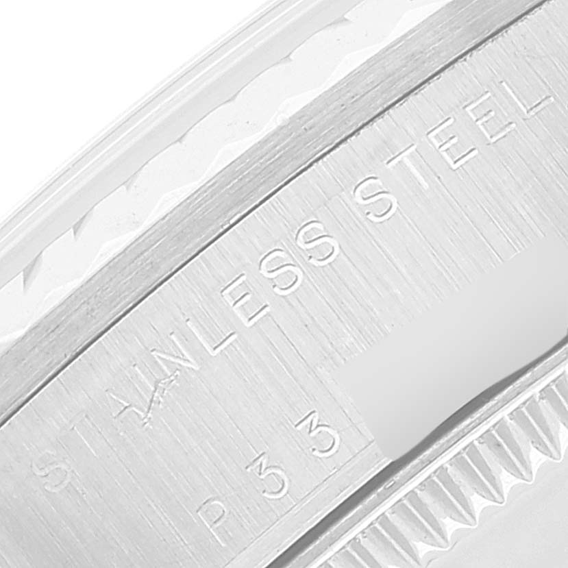 The image shows a close-up of the side engraving "STAINLESS STEEL" on a Rolex Mid-Size 78274 Women's Stainless Steel Silver Dial 78274 Women's Stainless Steel Silver Dial watch.