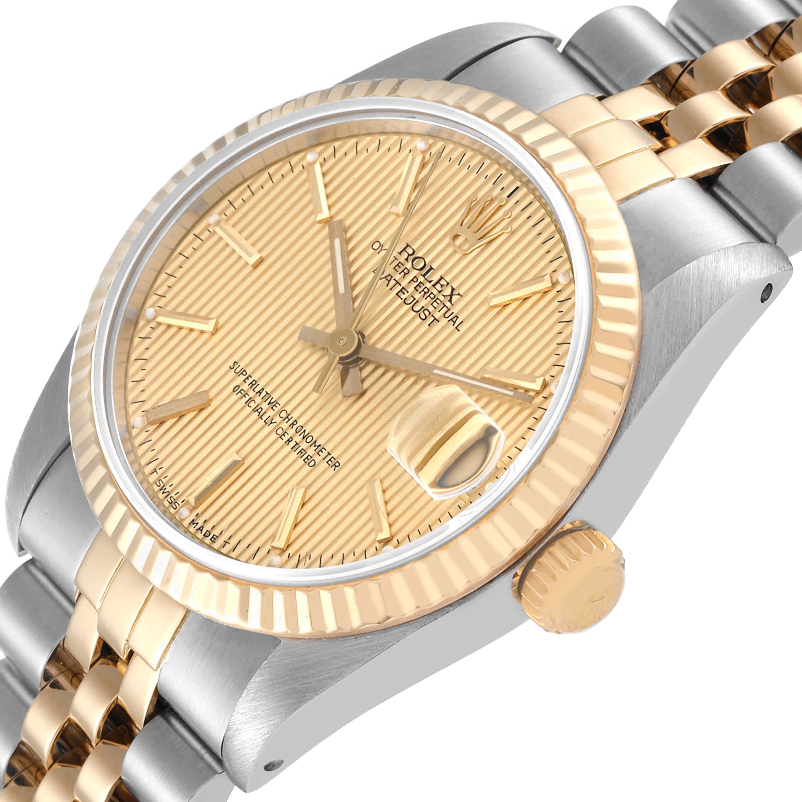 The image shows a close-up angled view of a Rolex Mid-Size 68273 Women
s Steel and Gold (two tone) Champagne Dial 68273 Women
s Steel and Gold (two tone) Champagne Dial Datejust watch, highlighting the face, crown, and bracelet.