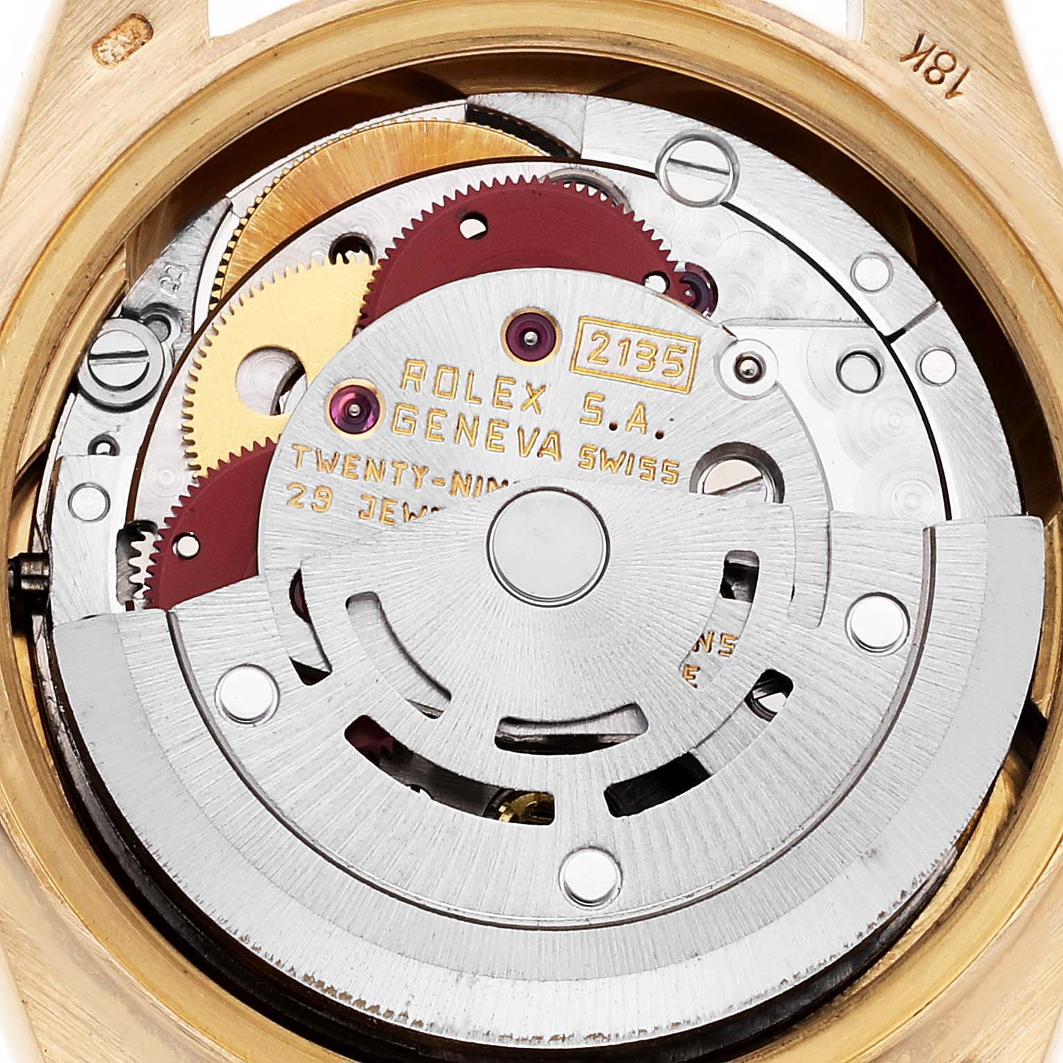 This image shows the internal mechanical movement of the Rolex President 69178 Women's Yellow Gold Champagne Dial 69178 Women's Yellow Gold Champagne Dial model, highlighting its gears and 18K gold casing.
