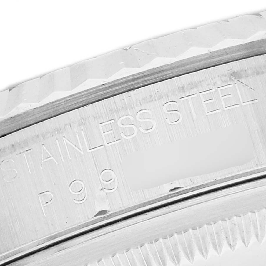 The image shows a close-up of the Datejust model by Rolex, focusing on the stainless steel casing with part of the model number visible.