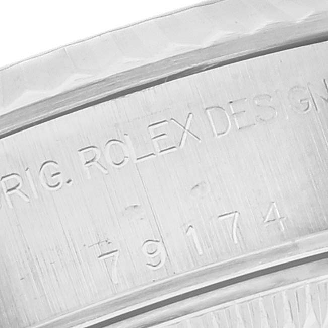 This image shows the engraved inner bezel with the model number of a Rolex Datejust 79174 Women's Stainless Steel Silver Dial 79174 Women's Stainless Steel Silver Dial watch.