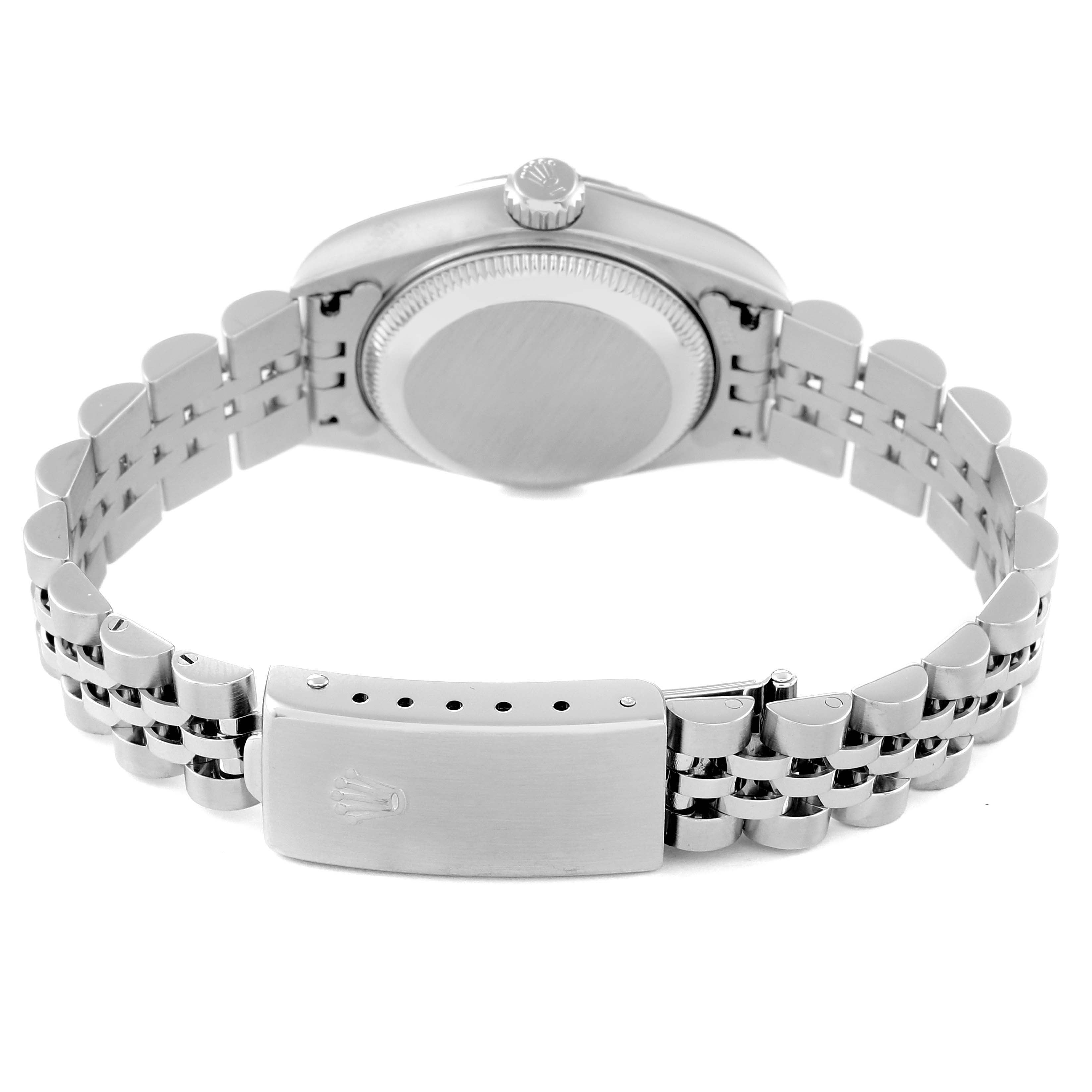 This image shows the back view of a Rolex Datejust 79174 Women's Stainless Steel Silver Dial 79174 Women's Stainless Steel Silver Dial model, highlighting its stainless steel case, crown, and bracelet clasp.