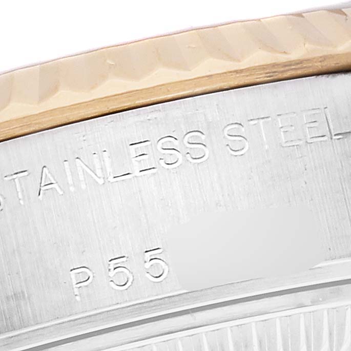 This close-up image shows the stainless steel casing and fluted bezel of a Rolex Datejust 79173 Women's Steel and Gold (two tone) Champagne Dial 79173 Women's Steel and Gold (two tone) Champagne Dial watch.