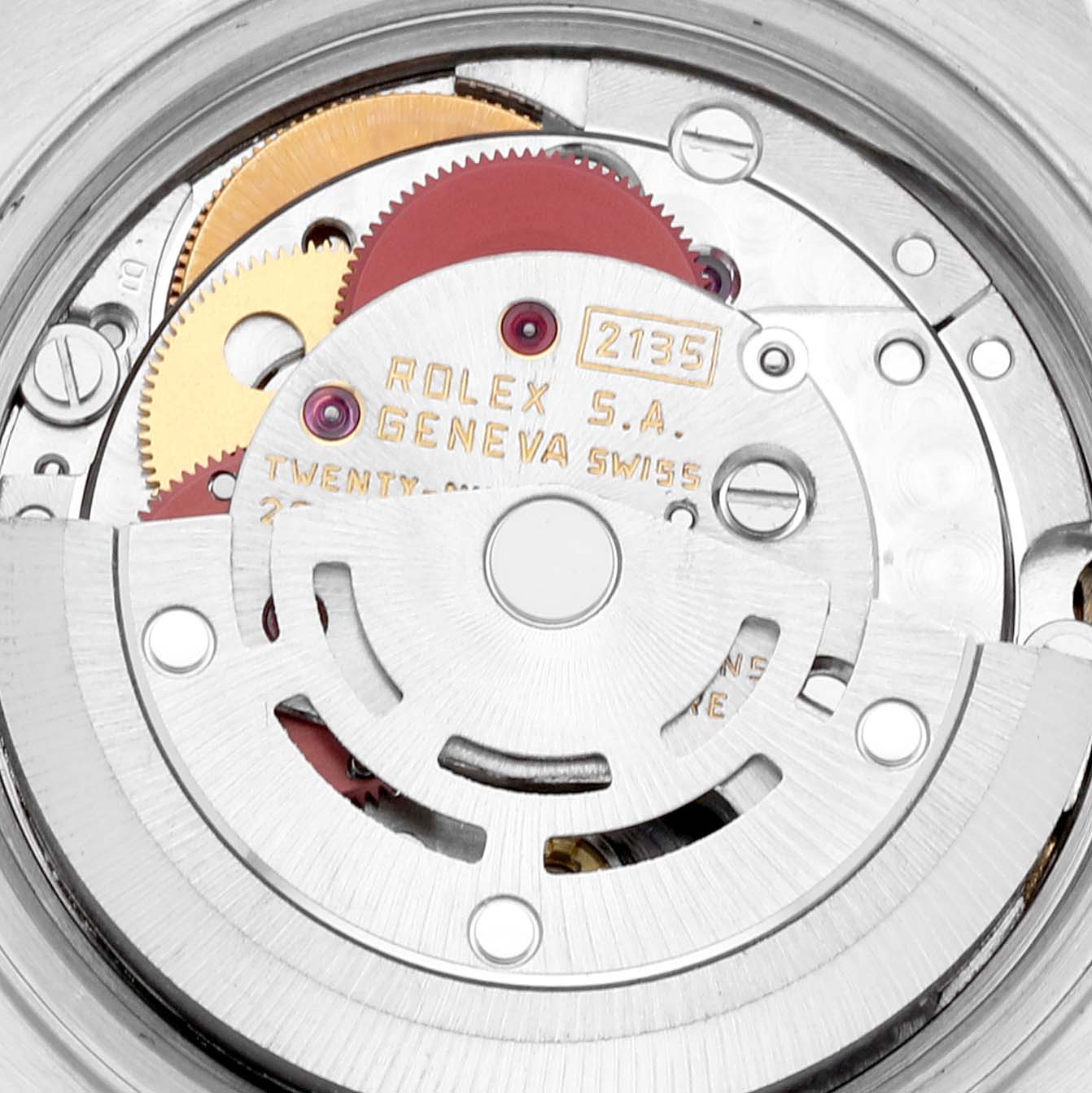 This image shows the inner movement mechanism of a Rolex Datejust 69173 Women's Steel and Gold (two tone) Champagne Dial 69173 Women's Steel and Gold (two tone) Champagne Dial watch, highlighting gears and the engraved rotor.