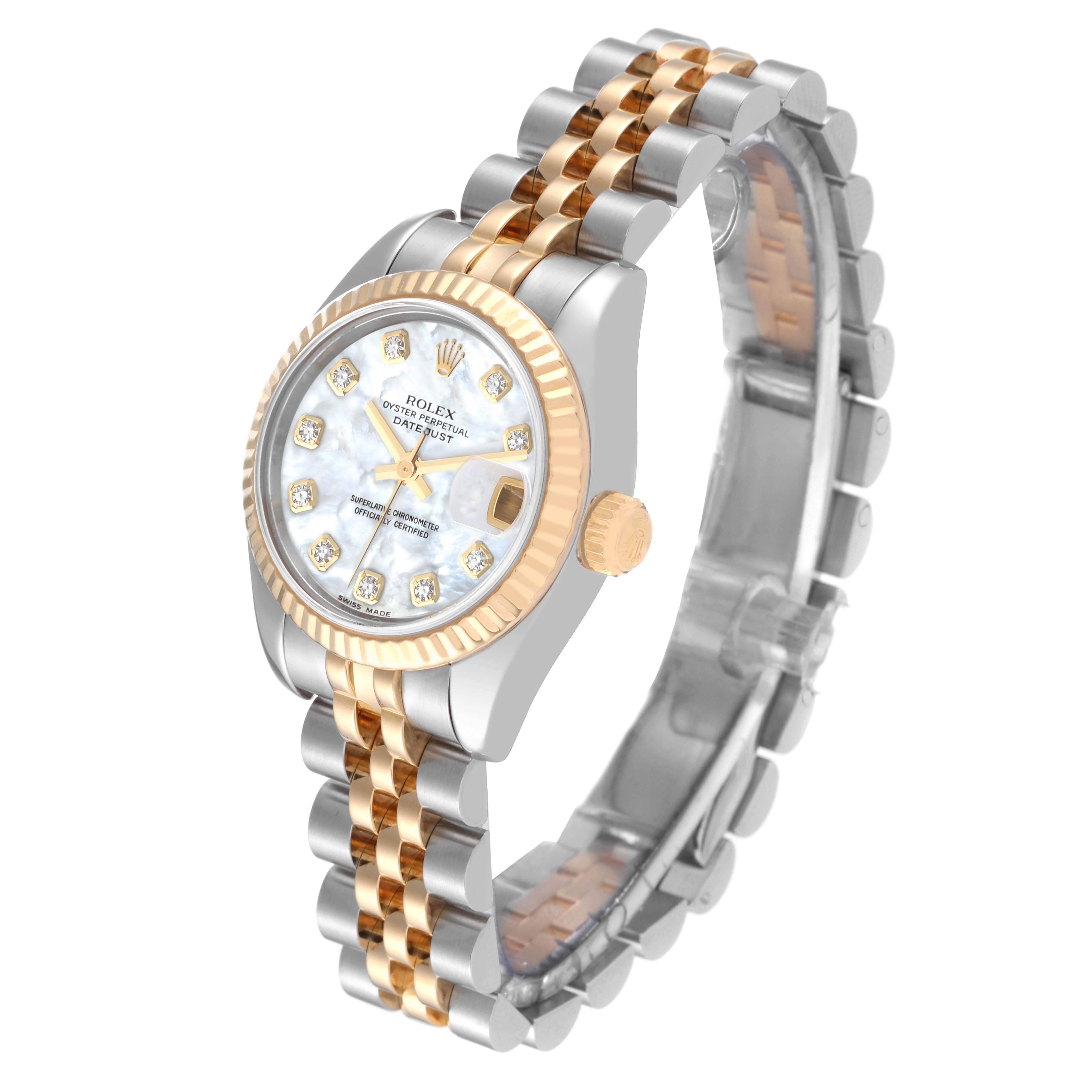 The image shows a Rolex Datejust 179173 Women's Steel and Gold (two tone) Mother of Pearl Dial 179173 Women's Steel and Gold (two tone) Mother of Pearl Dial watch with a two-tone bracelet, fluted bezel, and diamond hour markers, viewed at an angle.