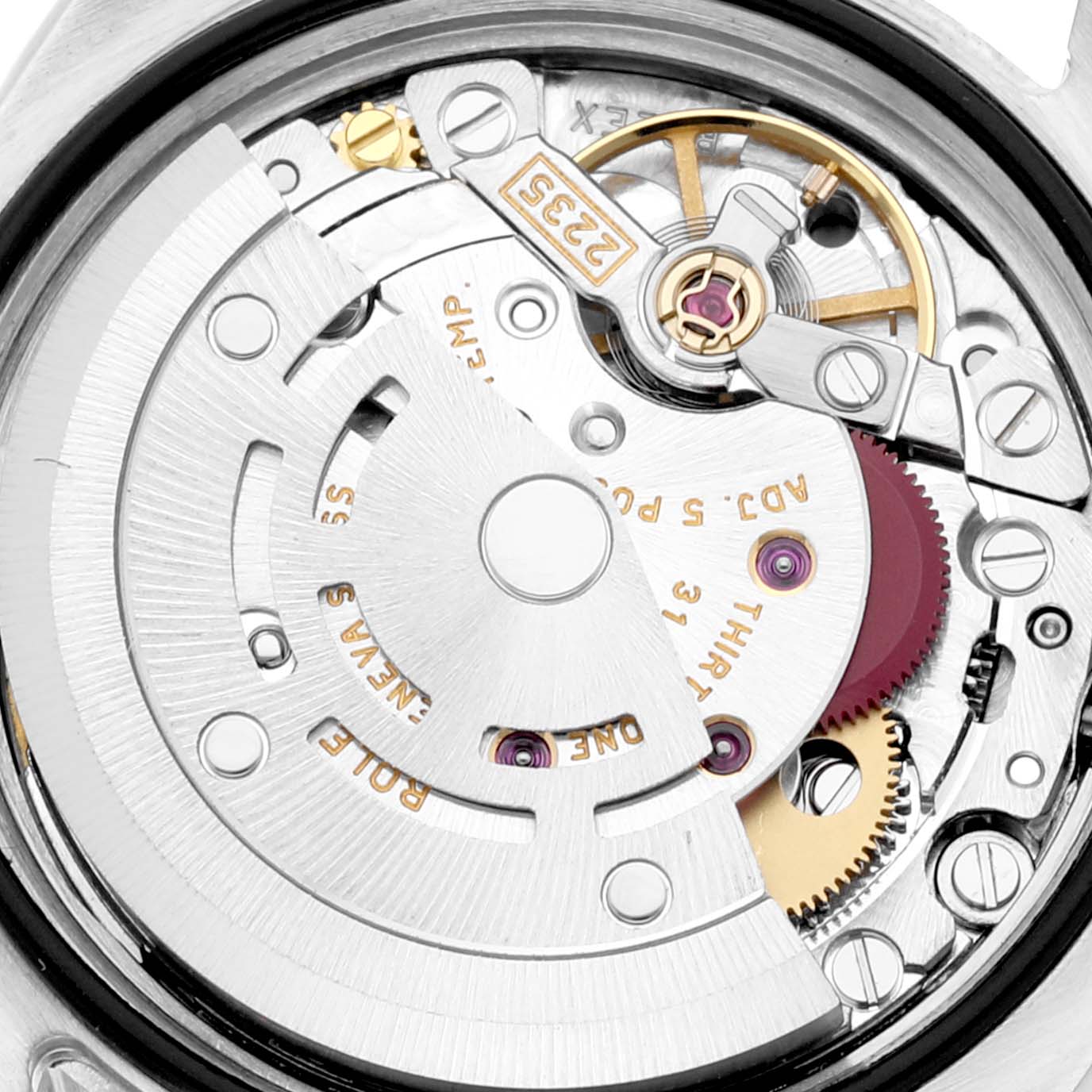 The image shows an internal view of the Rolex Datejust 179173 Women's Steel and Gold (two tone) Mother of Pearl Dial 179173 Women's Steel and Gold (two tone) Mother of Pearl Dial movement, emphasizing the rotor and gear mechanisms.