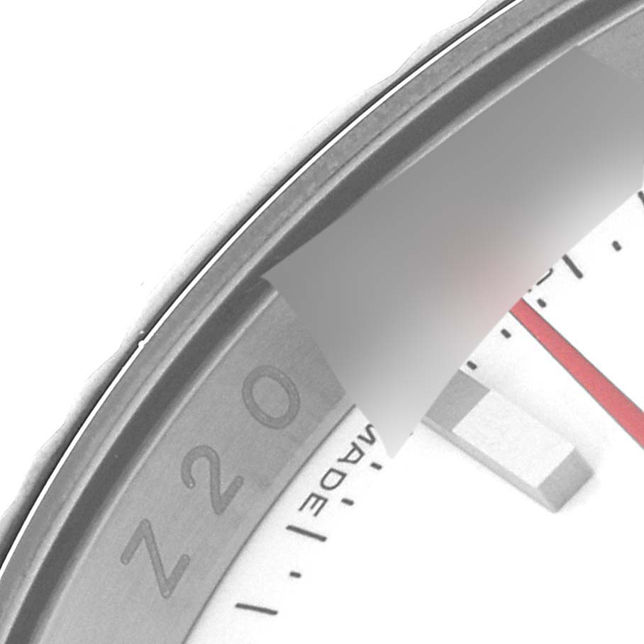 The image shows a close-up of the bezel and part of the dial of a Rolex Turn-o-Graph 116264 Men's Stainless Steel White Dial 116264 Men's Stainless Steel White Dial watch.