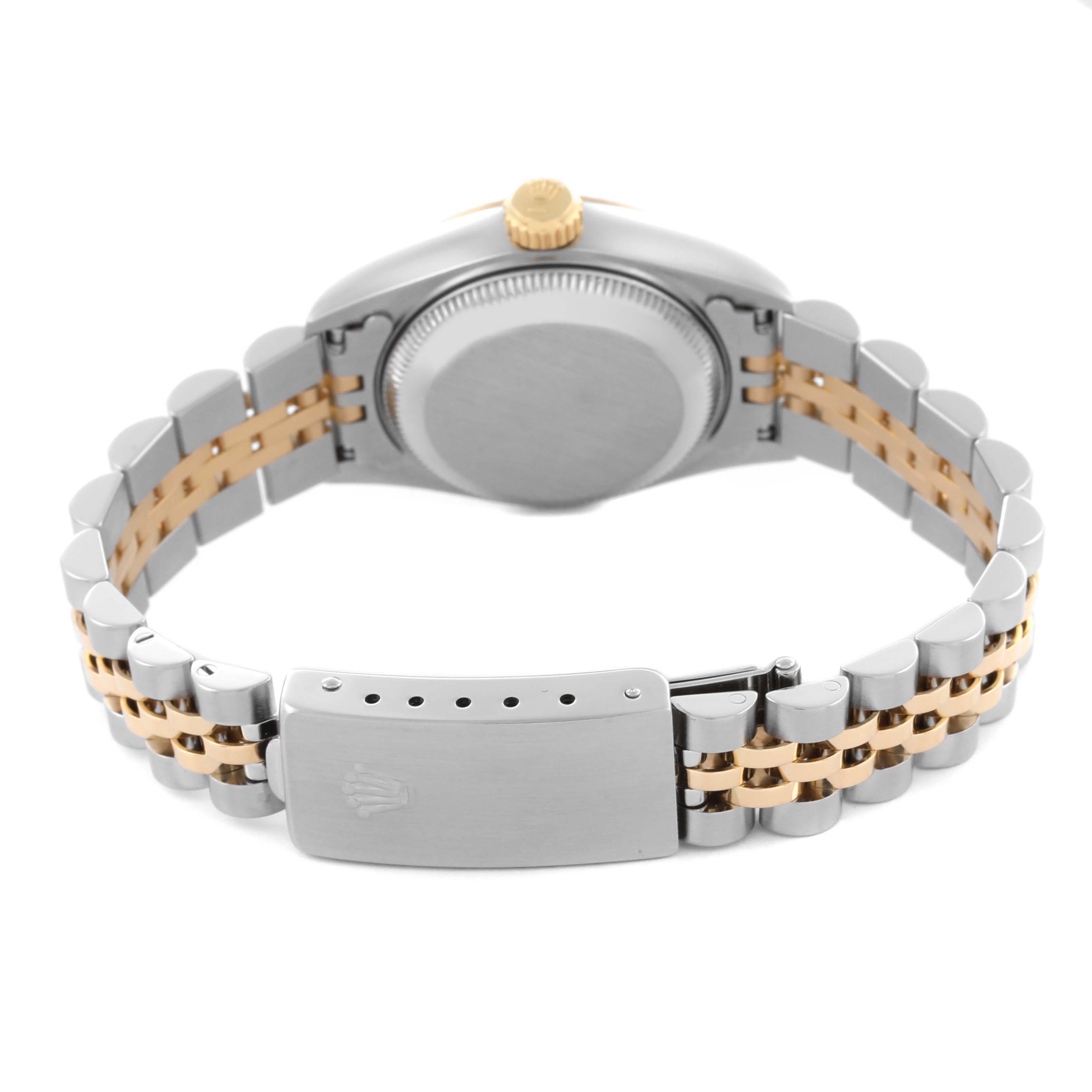 The image shows the back of a Rolex Datejust 69173 Women's Steel and Gold (two tone) White Dial 69173 Women's Steel and Gold (two tone) White Dial watch highlighting the bracelet, clasp, and crown.