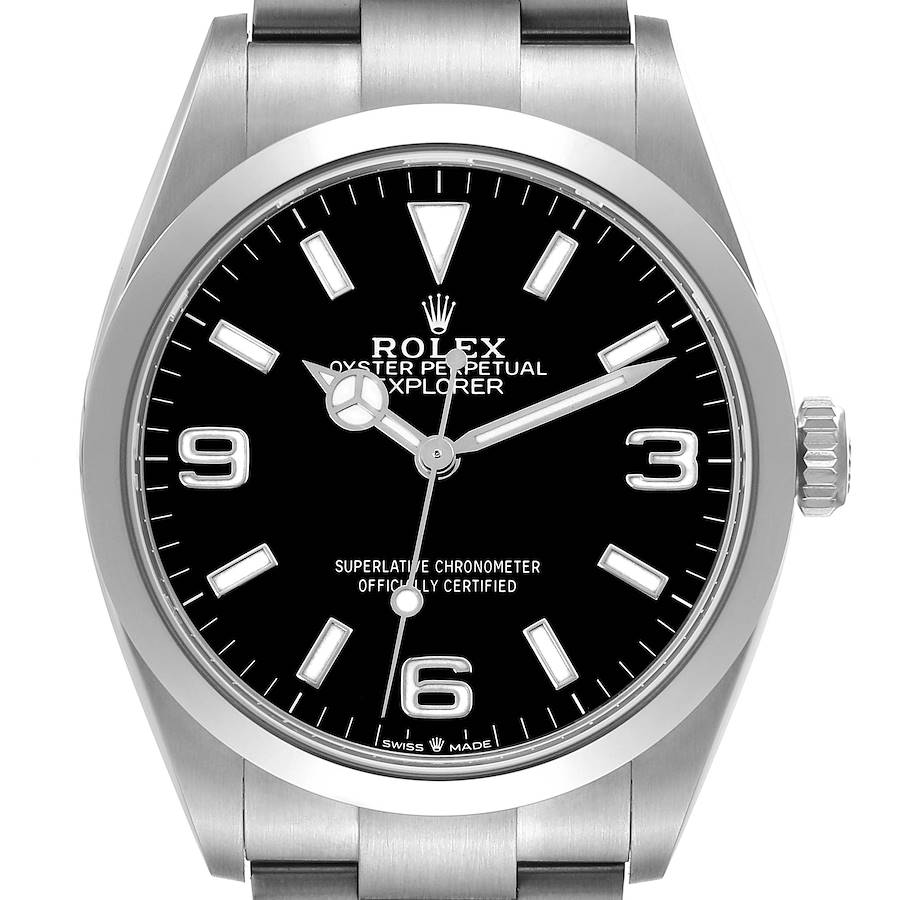 The Rolex Explorer watch is shown from a front angle, highlighting the dial, bezel, crown, and bracelet.