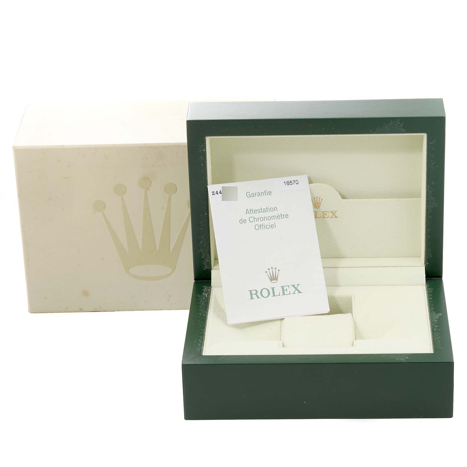 The image shows the box and warranty card for a Rolex Explorer 16570 Men
s Stainless Steel White Dial 16570 Men
s Stainless Steel White Dial model watch.