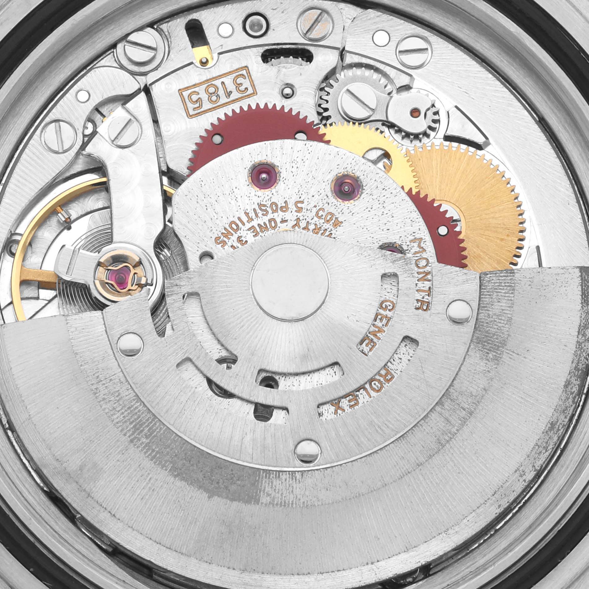 The image shows an internal view of the Rolex GMT-Master 16713 Men
s Steel and Gold (two tone) Brown Dial 16713 Men
s Steel and Gold (two tone) Brown Dial
s movement, highlighting gears and the rotor.
