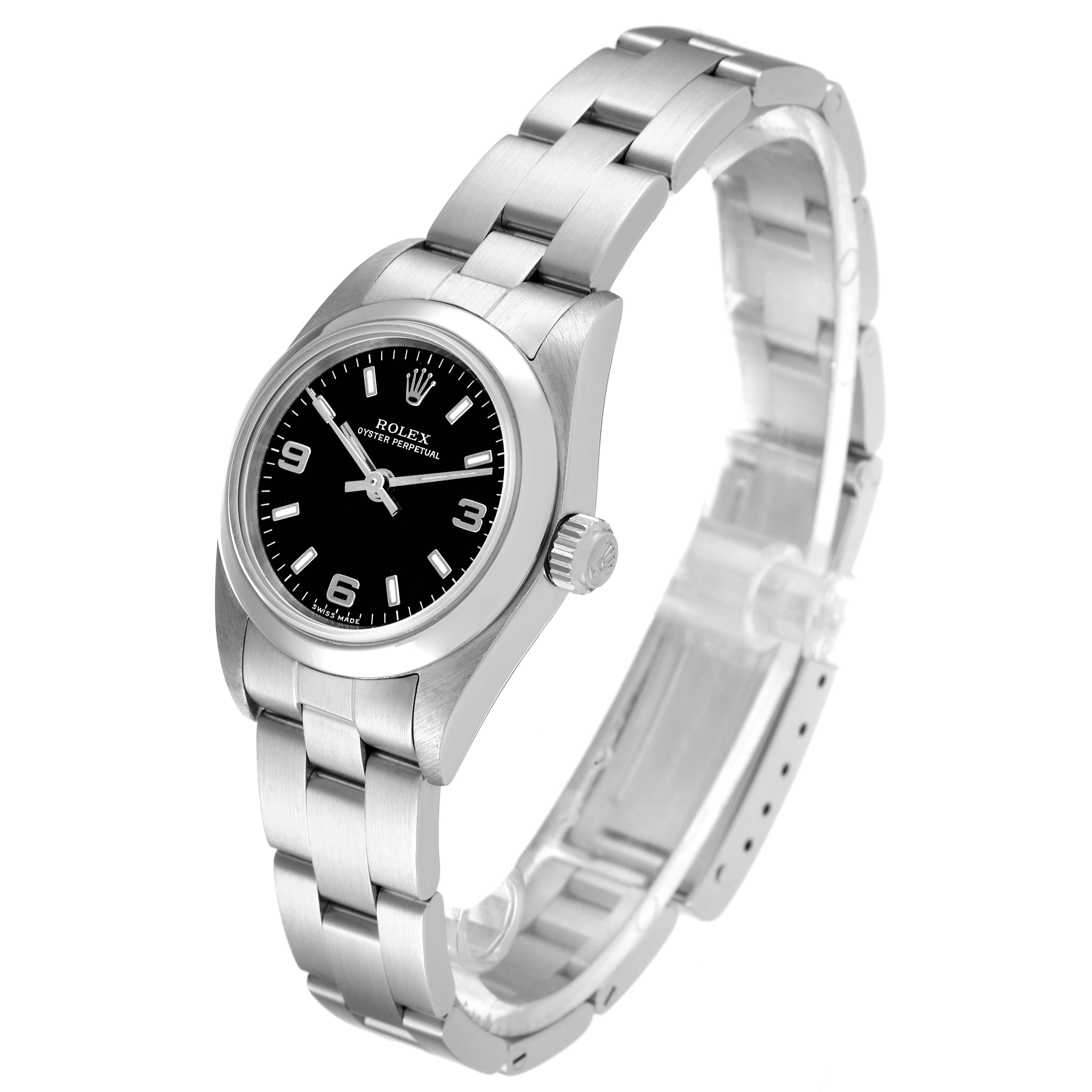 The image shows a side view of a Rolex Oyster Perpetual 76080 Women's Stainless Steel Black Dial 76080 Women's Stainless Steel Black Dial watch, highlighting the black dial, crown, and stainless steel bracelet.