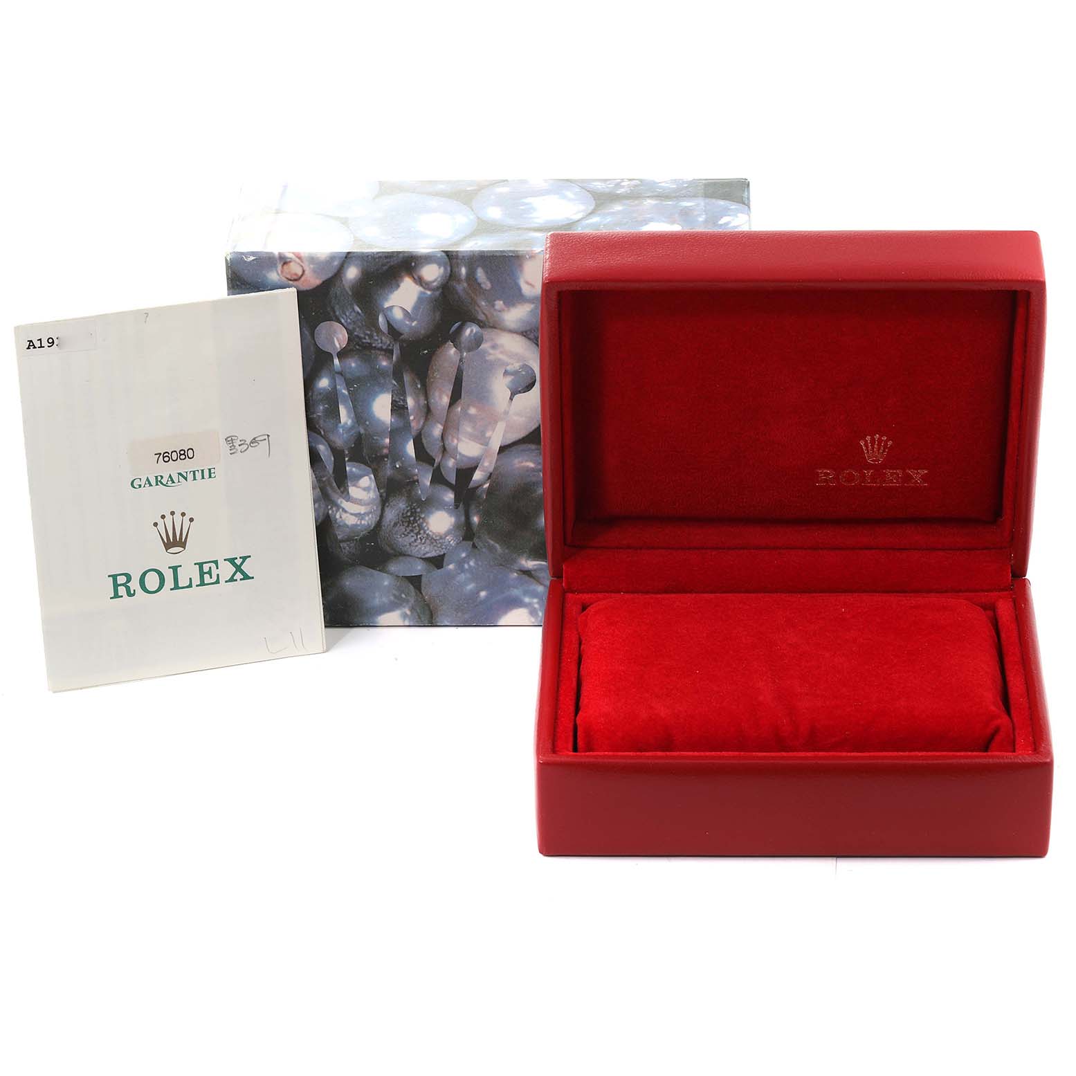 The image shows a red Rolex box and a warranty booklet for the Rolex Oyster Perpetual 76080 Women's Stainless Steel Black Dial 76080 Women's Stainless Steel Black Dial model.