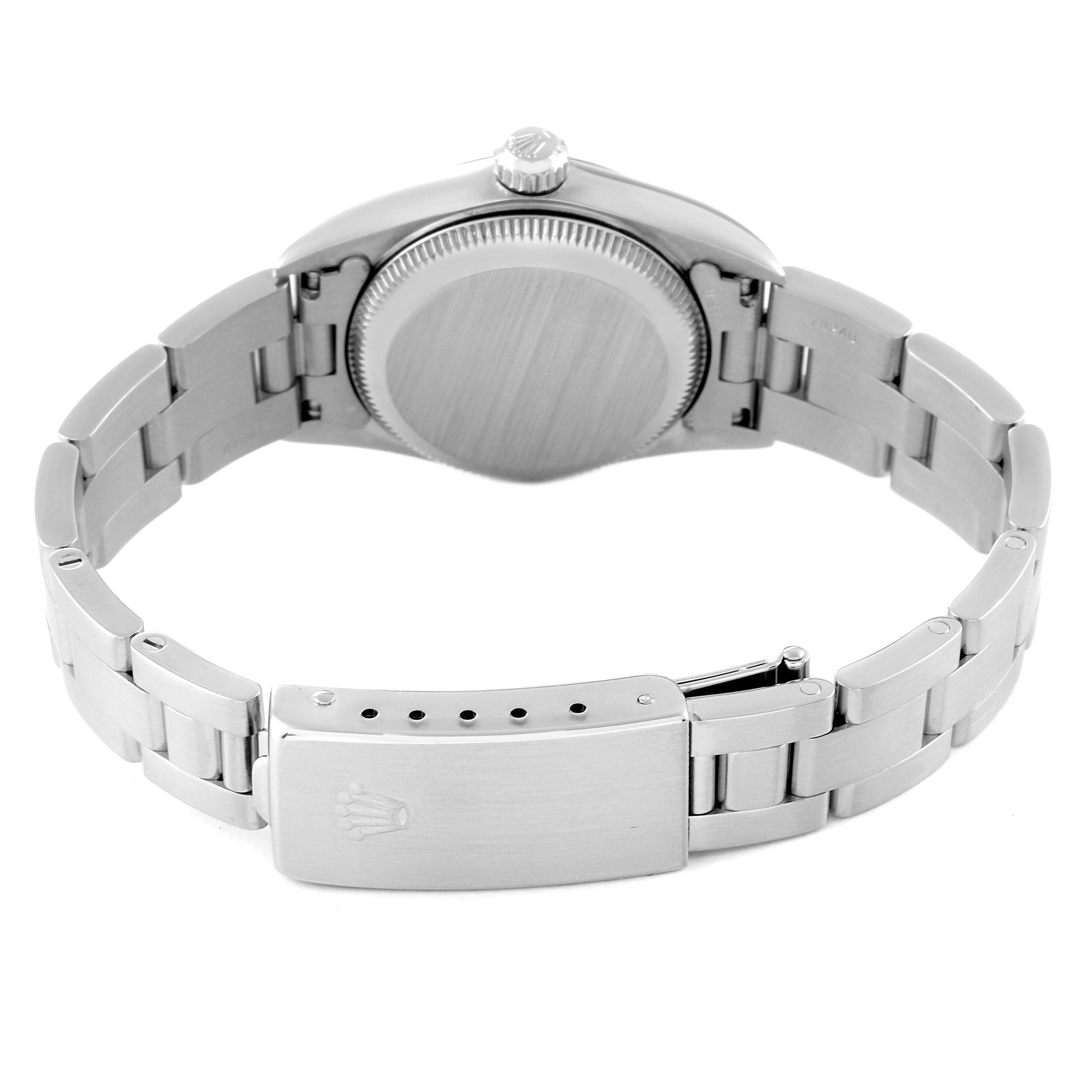 The image shows the back view of a Rolex Oyster Perpetual 76080 Women's Stainless Steel Black Dial 76080 Women's Stainless Steel Black Dial watch, focusing on the case back and closed clasp of the bracelet.