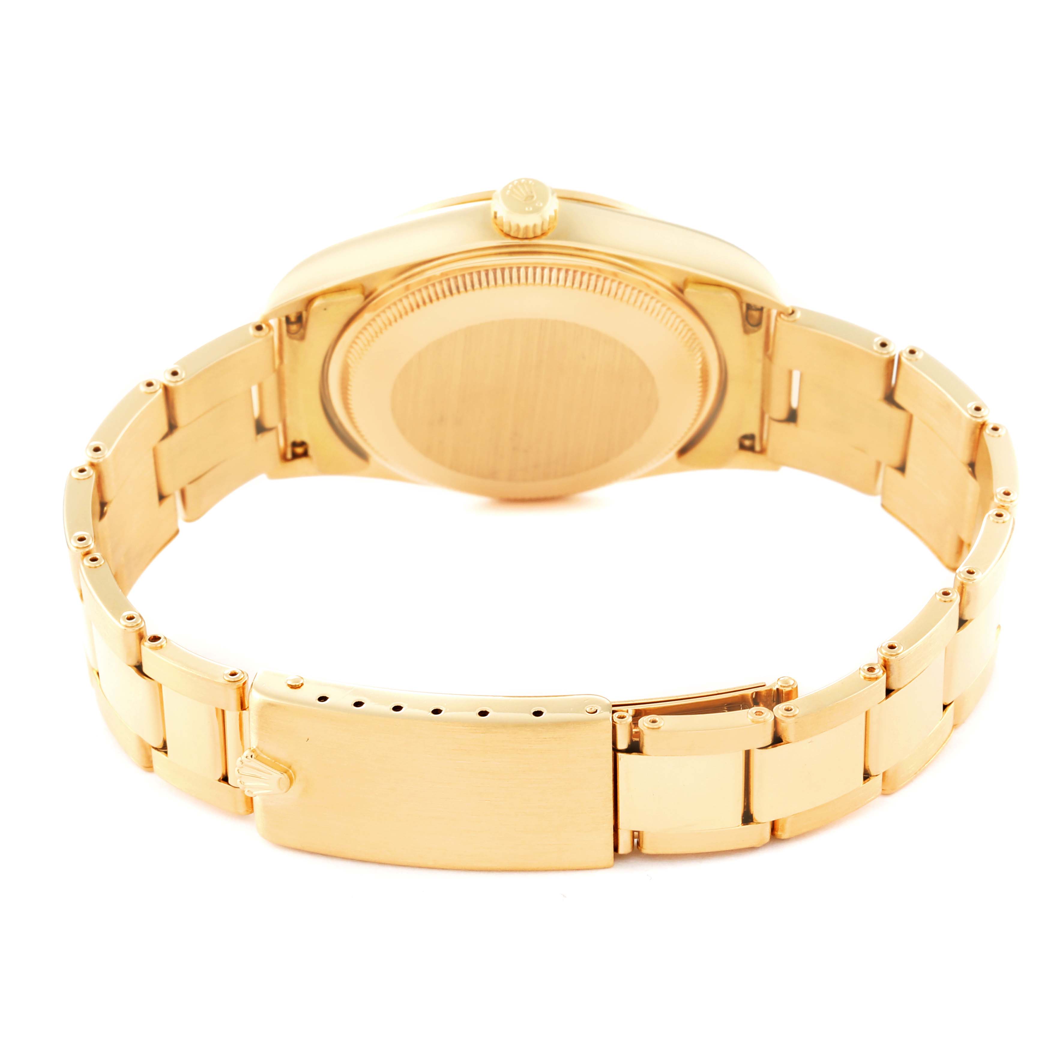 The image shows the back side and bracelet of a Rolex President 14208M Men
s Yellow Gold Champagne Dial 14208M Men
s Yellow Gold Champagne Dial model watch, viewed from a rear angle.