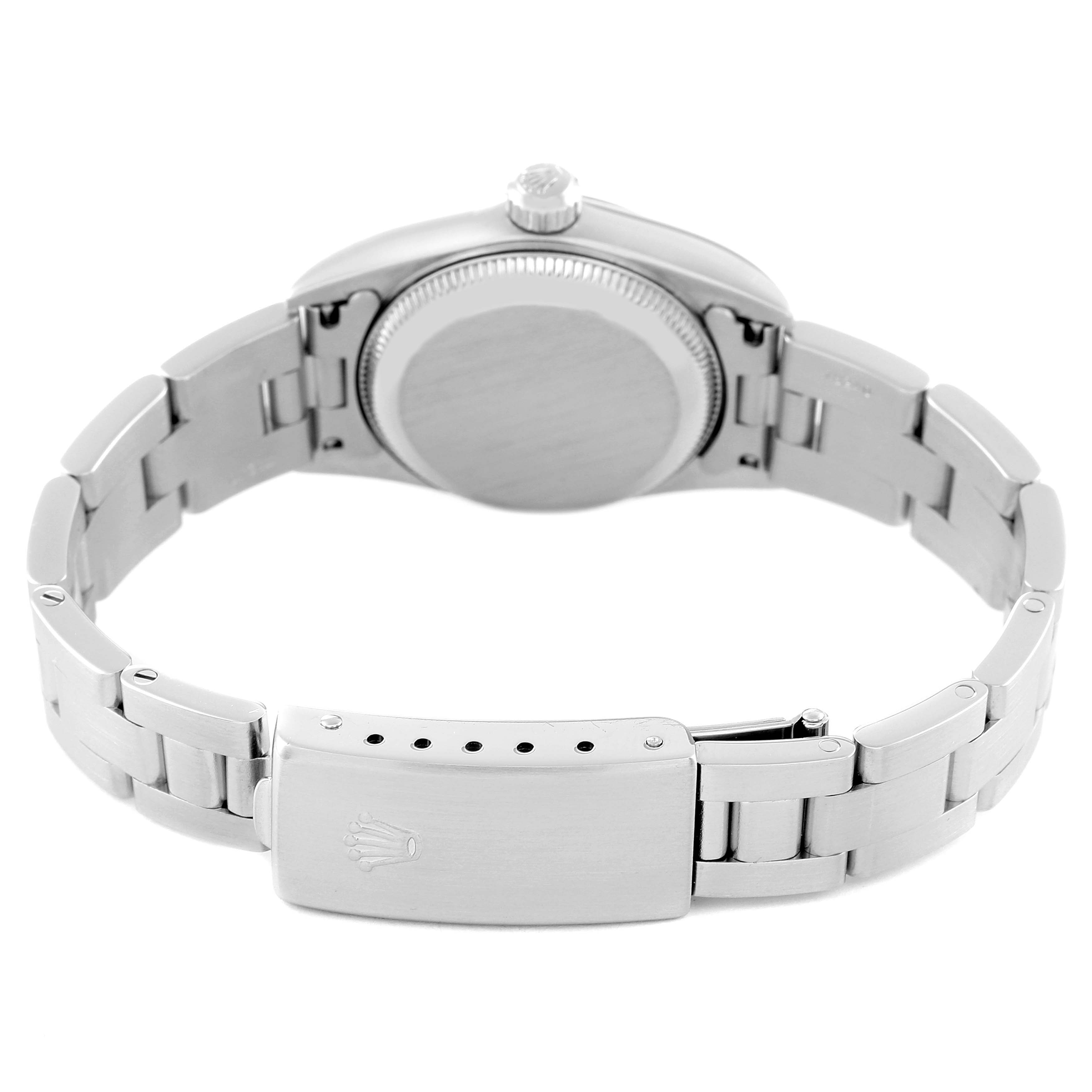 This image shows the back case, bracelet, and clasp of a Rolex Oyster Perpetual 76080 Women
s Stainless Steel Pink Dial 76080 Women
s Stainless Steel Pink Dial watch from the rear angle.