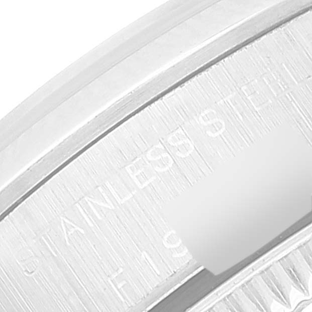 This image shows a close-up of the case back of a Rolex Oyster Perpetual 76080 Women
s Stainless Steel Pink Dial 76080 Women
s Stainless Steel Pink Dial watch, highlighting its stainless steel material.