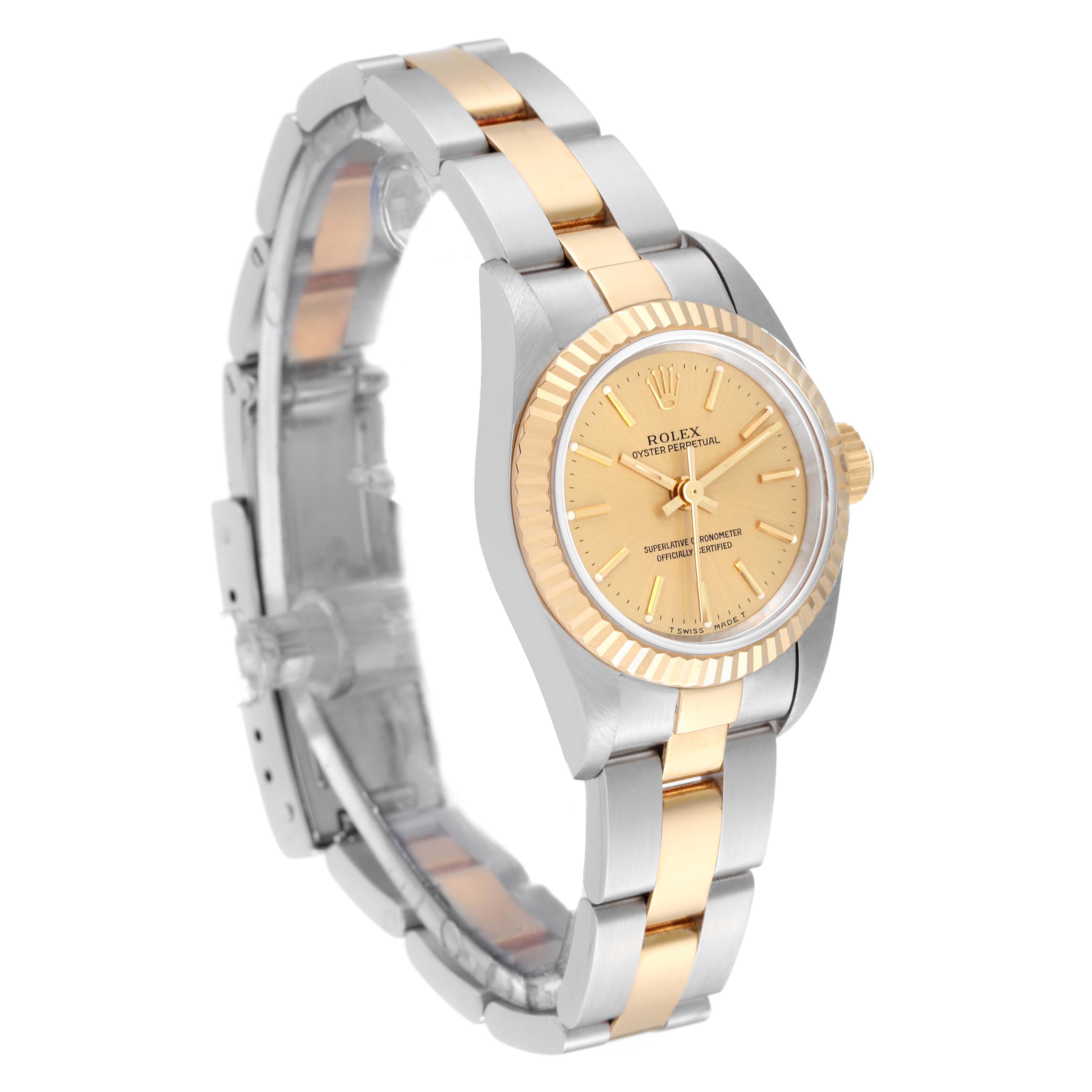 The Rolex Oyster Perpetual 67193 Women's Steel and Gold (two tone) Champagne Dial 67193 Women's Steel and Gold (two tone) Champagne Dial watch is shown at a three-quarter angle, highlighting the gold and silver-toned bracelet and fluted bezel.