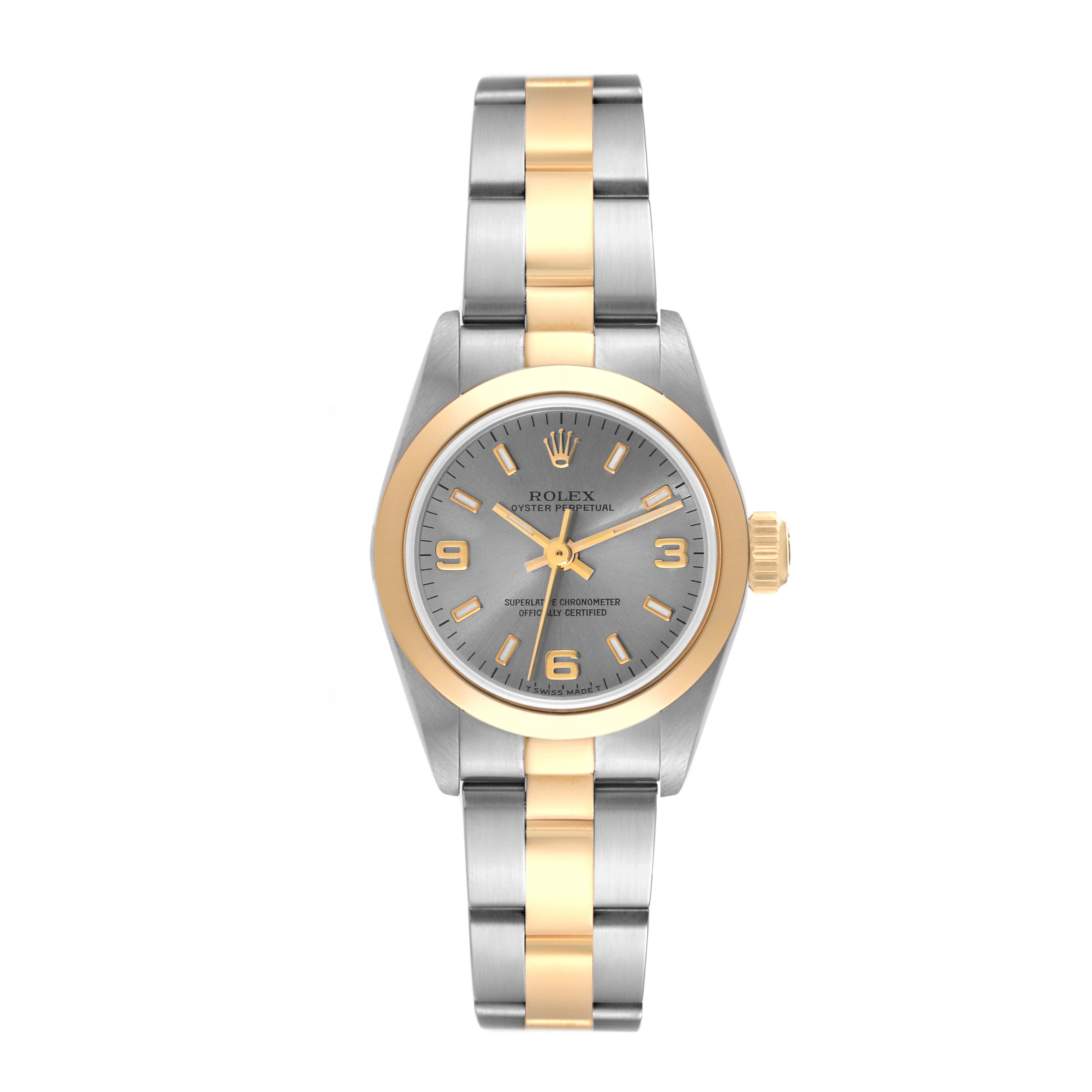 This image shows a front view of a Rolex Oyster Perpetual 67183 Women's Steel and Gold (two tone) Grey Dial 67183 Women's Steel and Gold (two tone) Grey Dial watch featuring a two-tone bracelet and gold bezel.