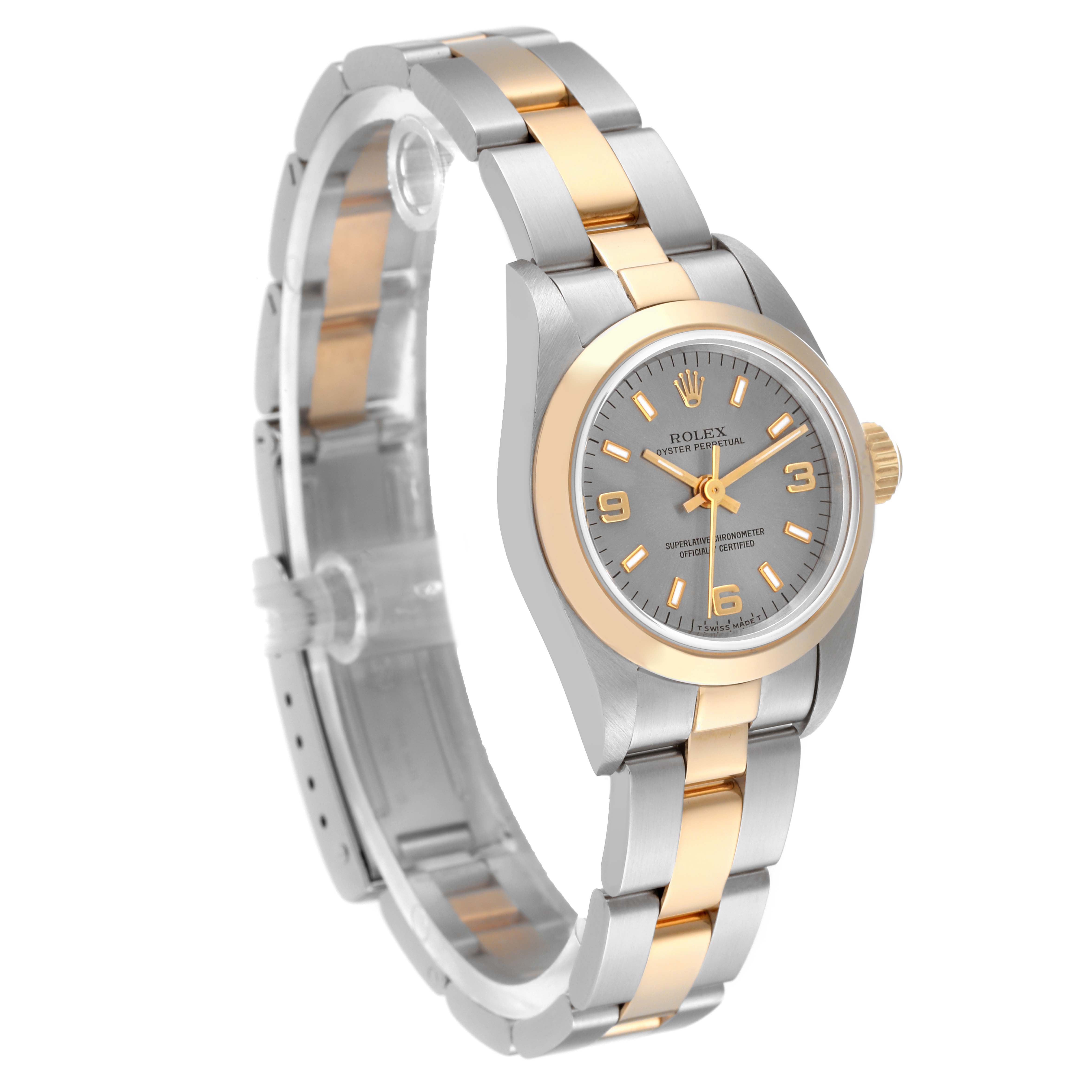 The image shows a Rolex Oyster Perpetual 67183 Women's Steel and Gold (two tone) Grey Dial 67183 Women's Steel and Gold (two tone) Grey Dial watch taken at a three-quarter angle, displaying the face, bezel, and bracelet.