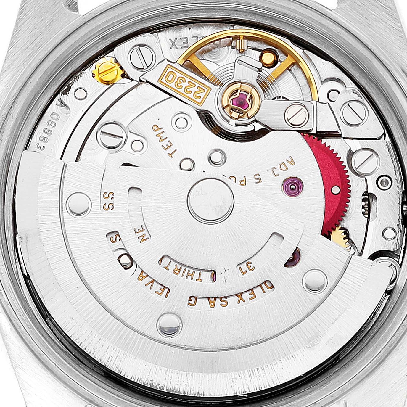 The image shows the internal mechanism of a Rolex Oyster Perpetual 76080 Women's Stainless Steel White Dial 76080 Women's Stainless Steel White Dial watch, focusing on the movement and rotor.